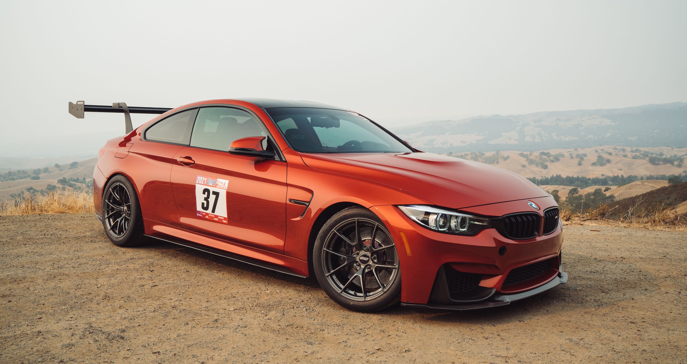 Orange BMW F82 Coupe M4 with 18" VS-5RS Apex wheels in Anthracite