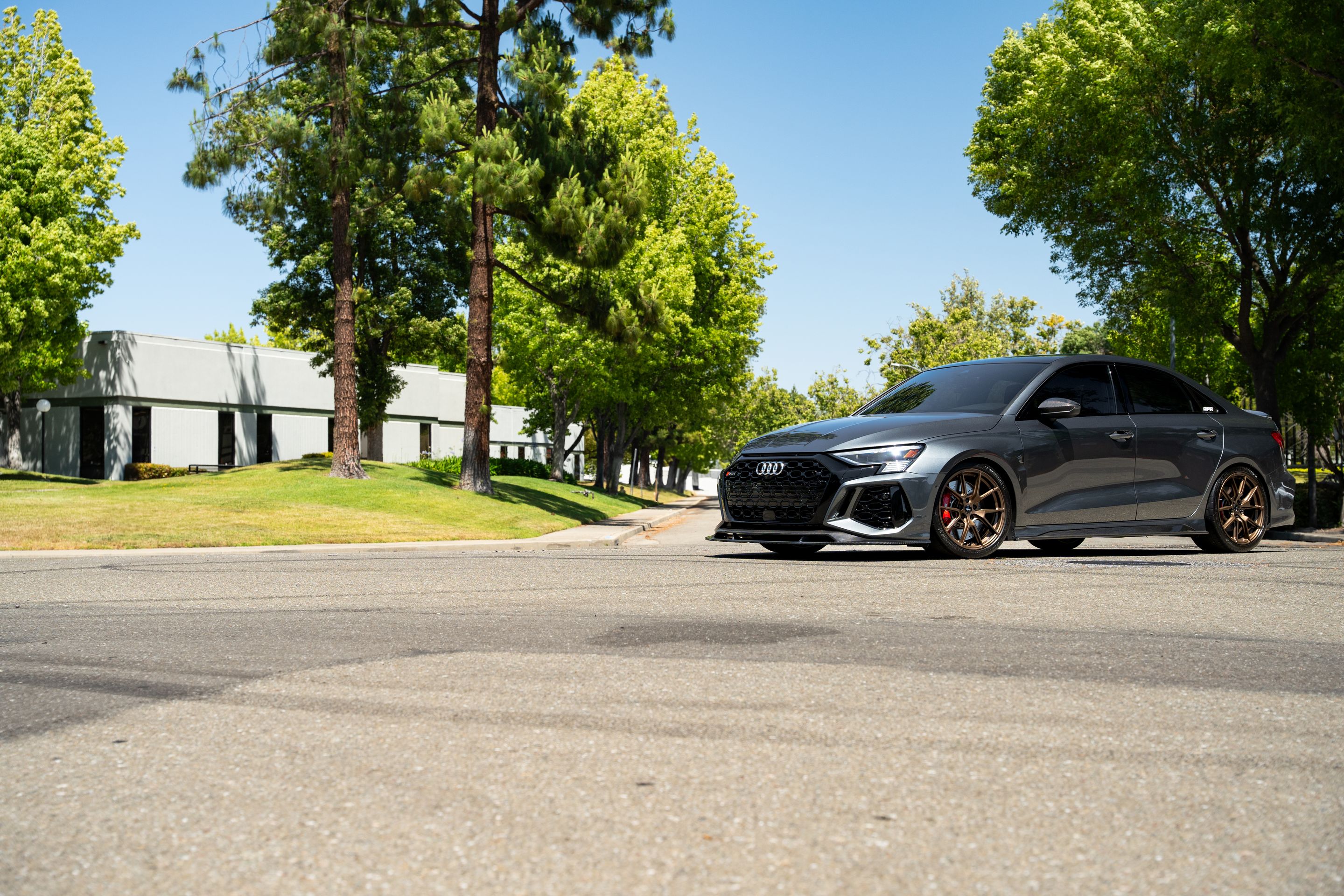 Grey Audi 8Y RS 3 with 18" VS-5 Apex wheels in Satin Bronze