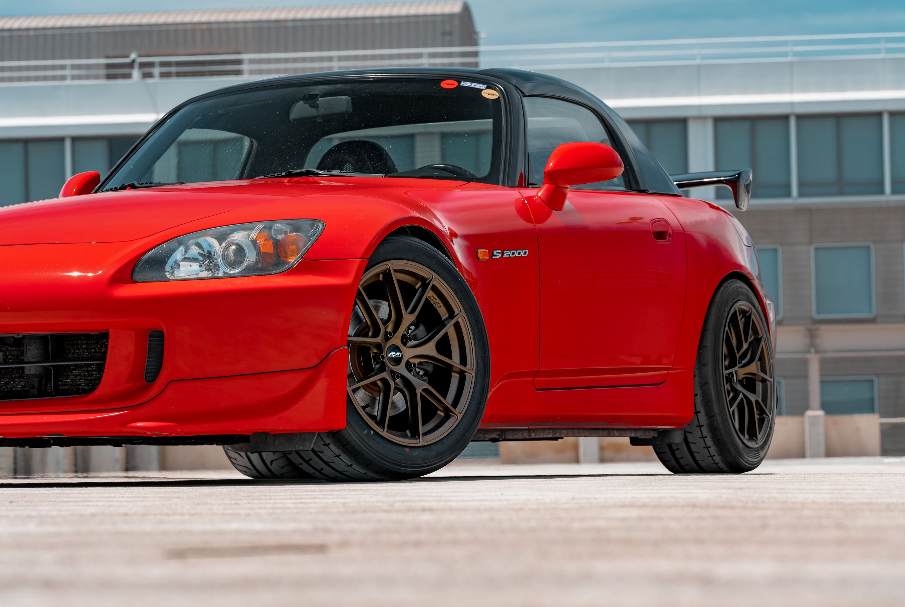 Red Honda S2000 with 17" VS-5RS Apex wheels in Satin Bronze