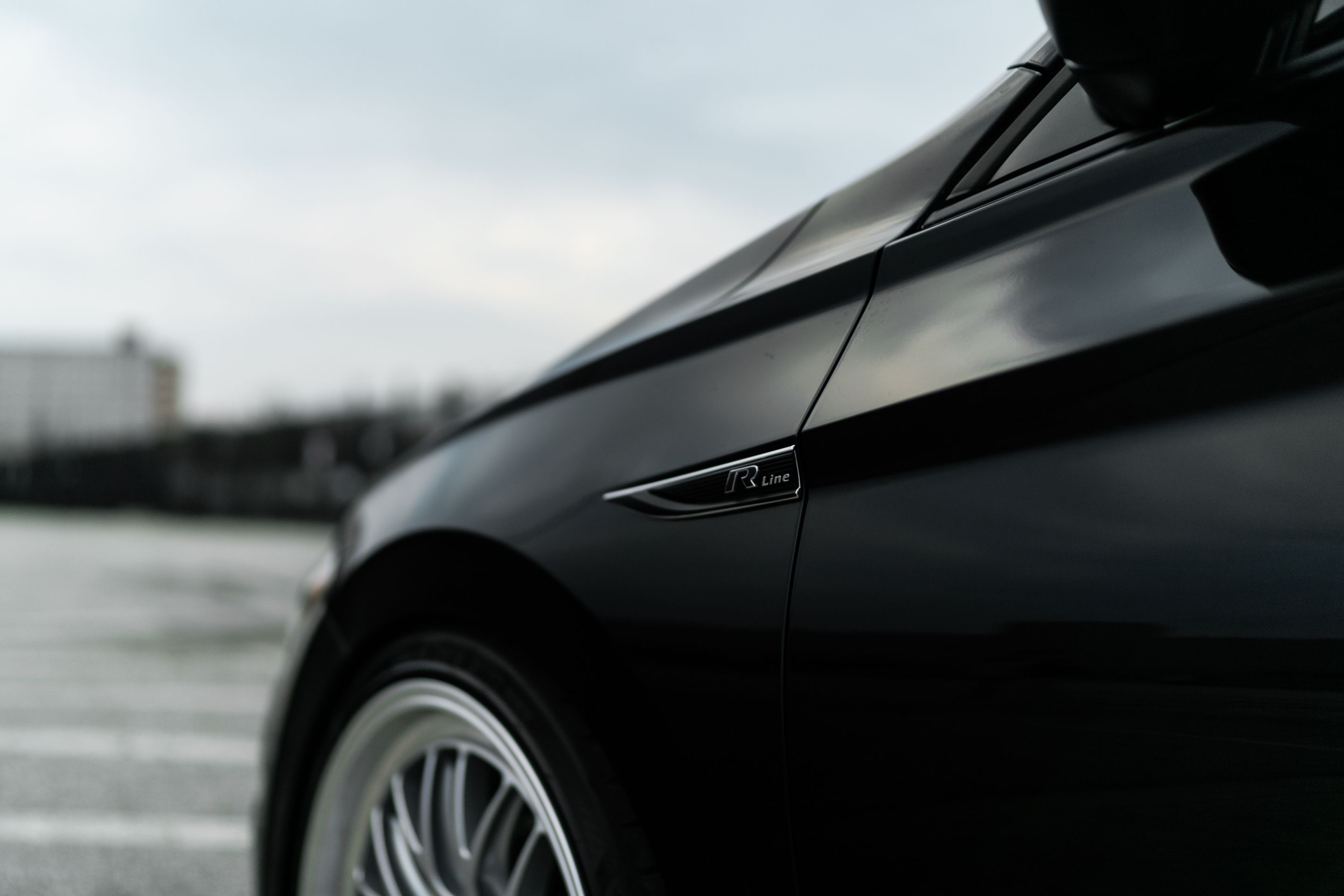 Black VW MK7 Jetta with 19" ML-10RT Apex wheels in Machined Lip Race Silver
