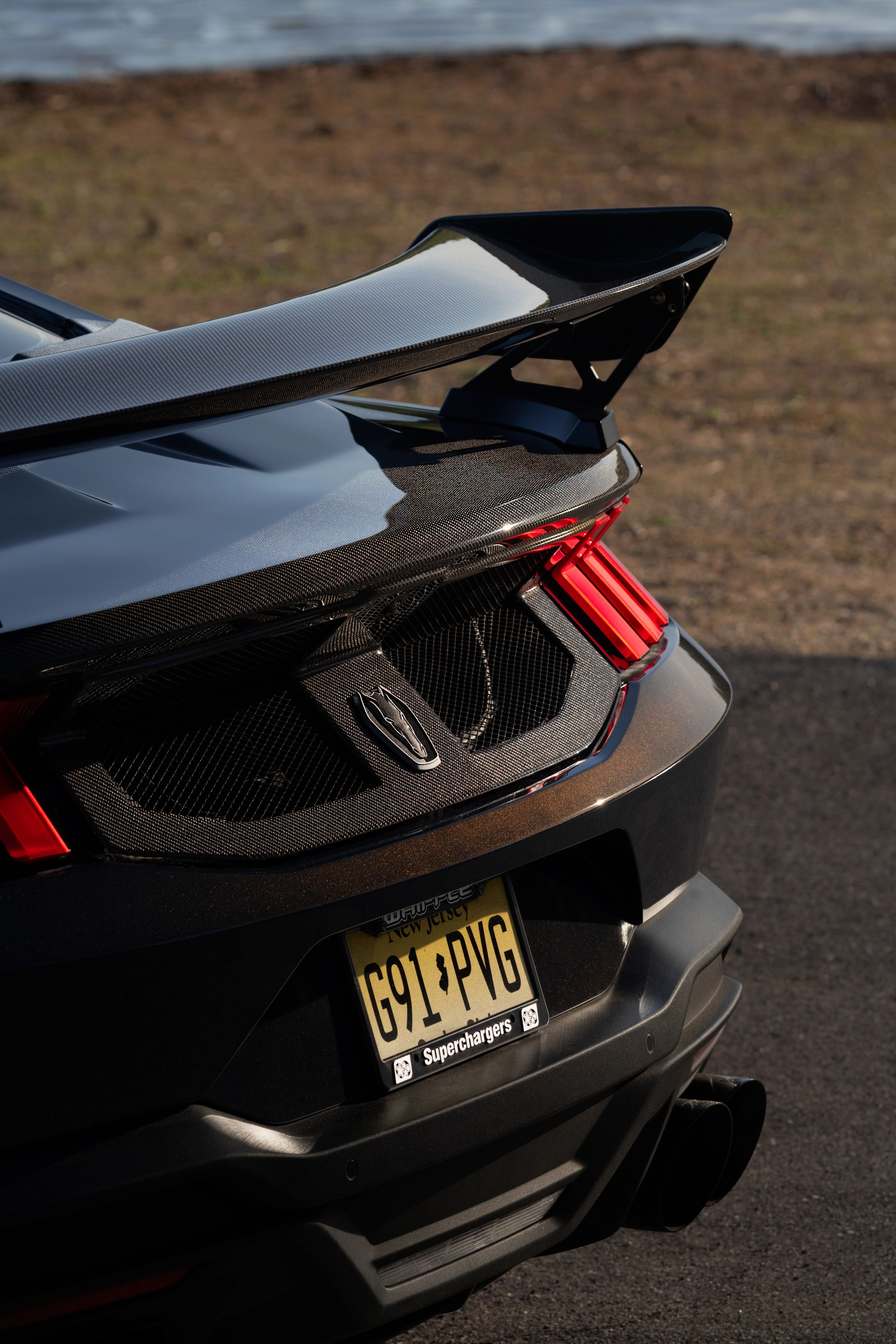 Orange Ford S650 Mustang Dark Horse with 20" VS-5RS Apex wheels in Satin Bronze