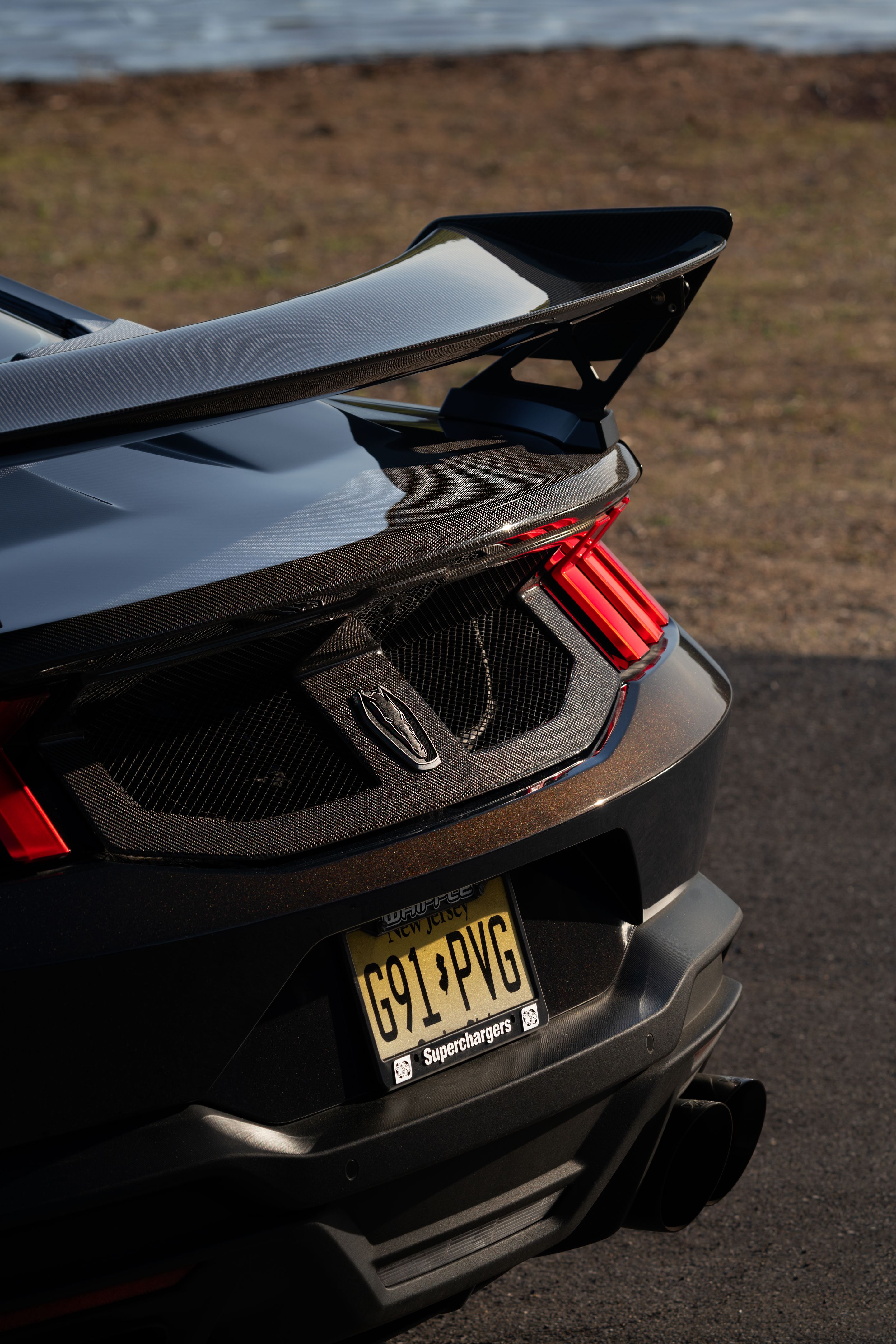 Orange Ford S650 Mustang Dark Horse with 20" VS-5RS Apex wheels in Satin Bronze