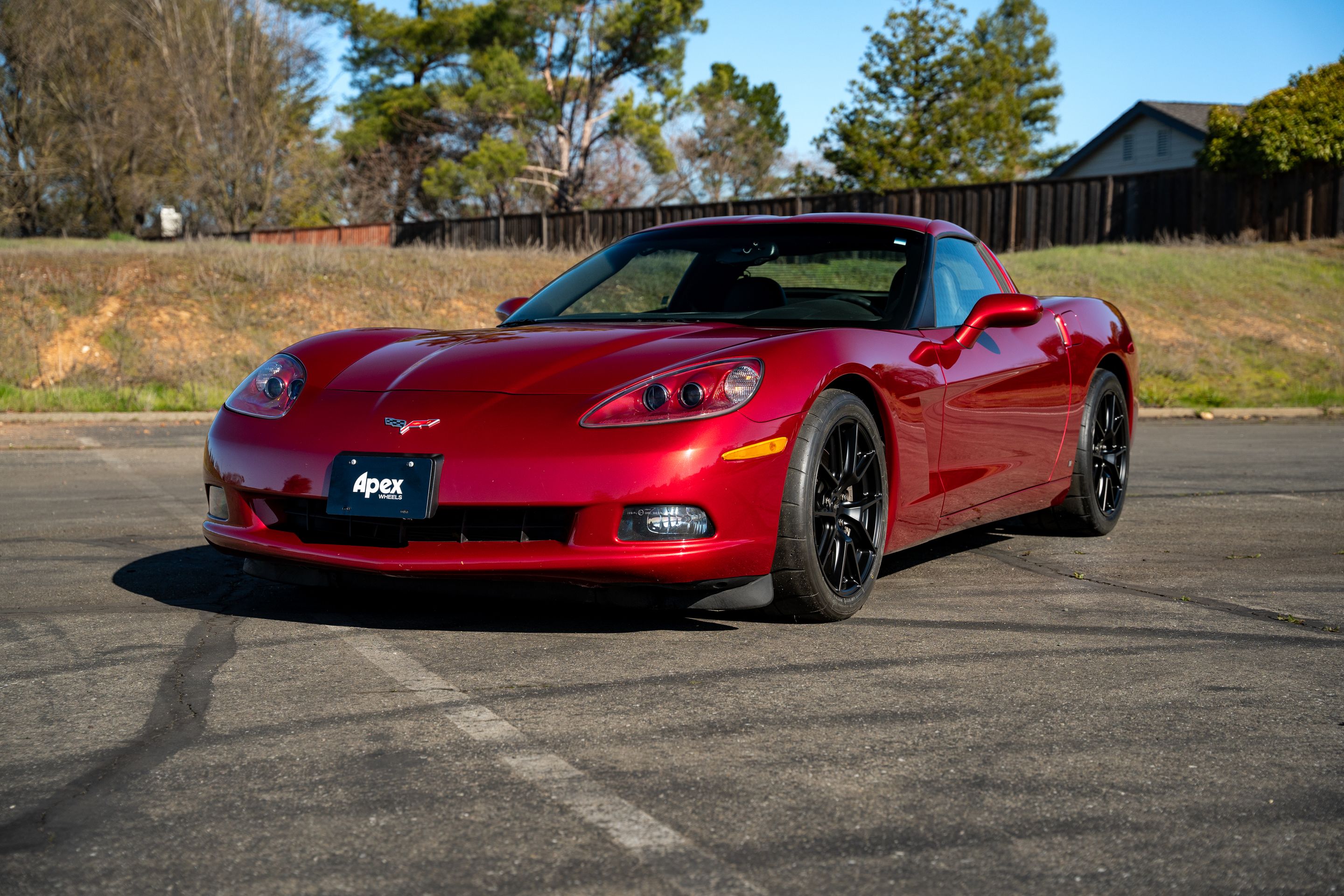 Red Chevrolet C6 Corvette Base/Z51 with 18" VS-5 Apex wheels in Satin Black