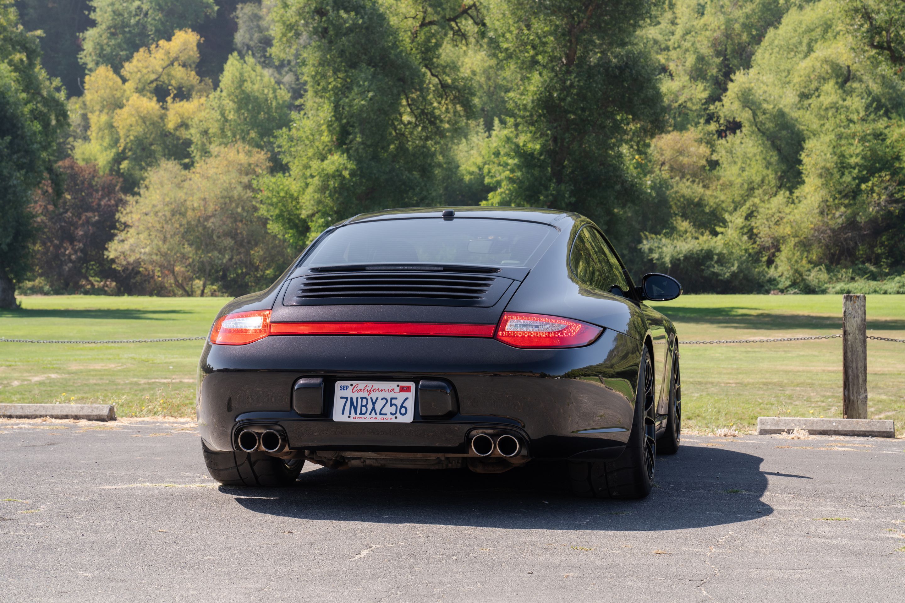 Black Porsche 911 997 Carrera 4S with 18" EC-7RS Apex wheels in Satin Black