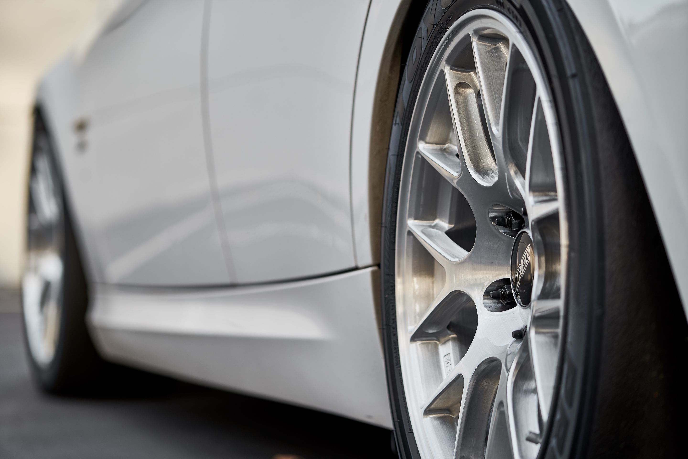 White BMW E90 LCI Sedan 3 Series with 17" EC-7R Apex wheels in Brushed Clear