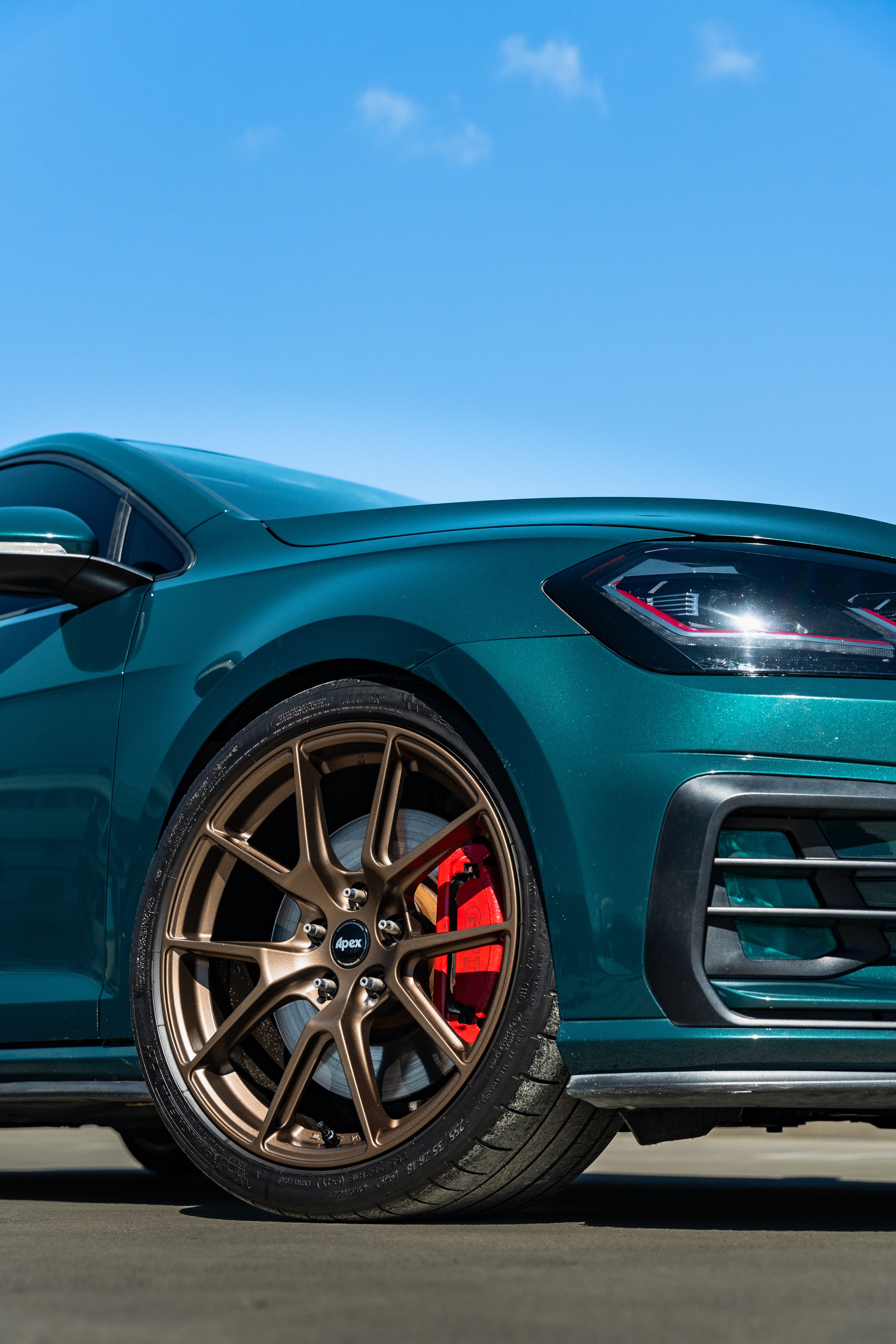 Green VW MK7 GTI with 18" VS-5 Apex wheels in Satin Bronze