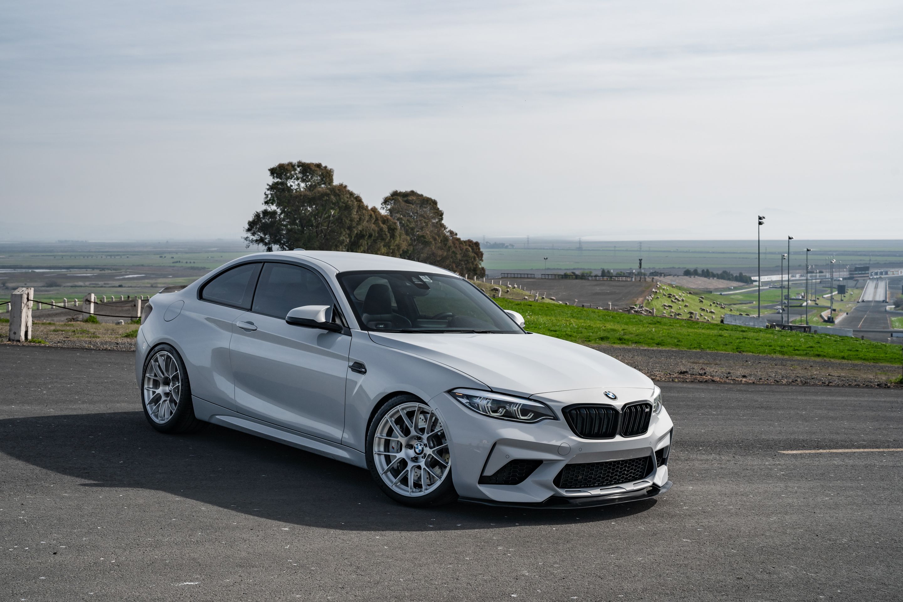 Silver BMW F87 M2 with 19" EC-7RS Apex wheels in Brushed Clear