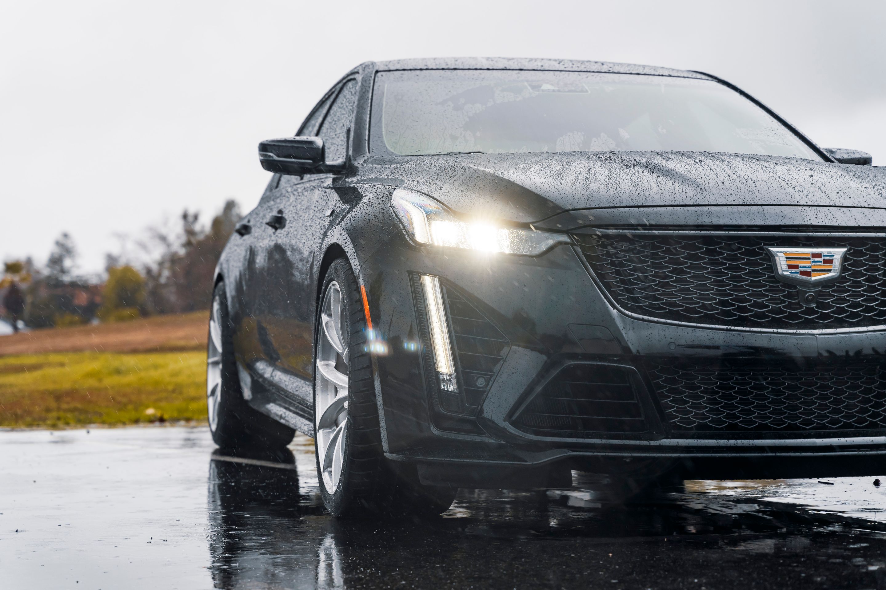 Black Cadillac CT5-V Blackwing with 20" VS-5RS Apex wheels in Brushed Clear