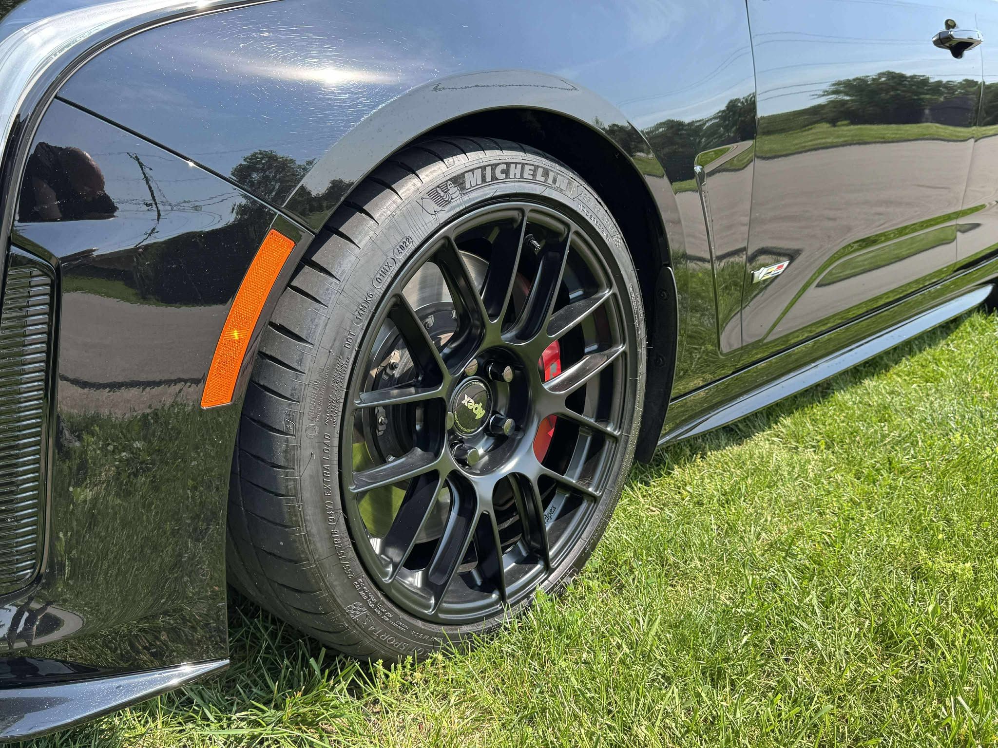 Black Cadillac CT4-V Blackwing with 18" EC-7RS Apex wheels in Satin Black