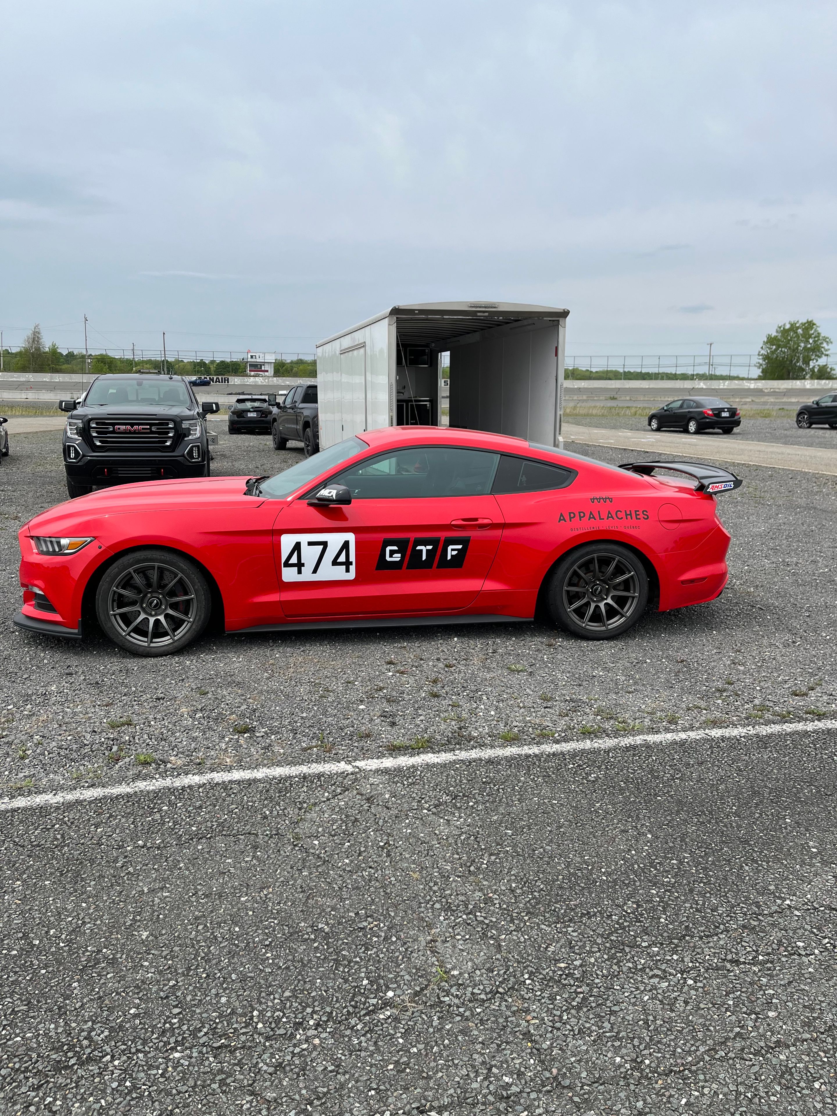 Red Ford S550 Mustang GT with 18" SM-10 Apex wheels in Anthracite