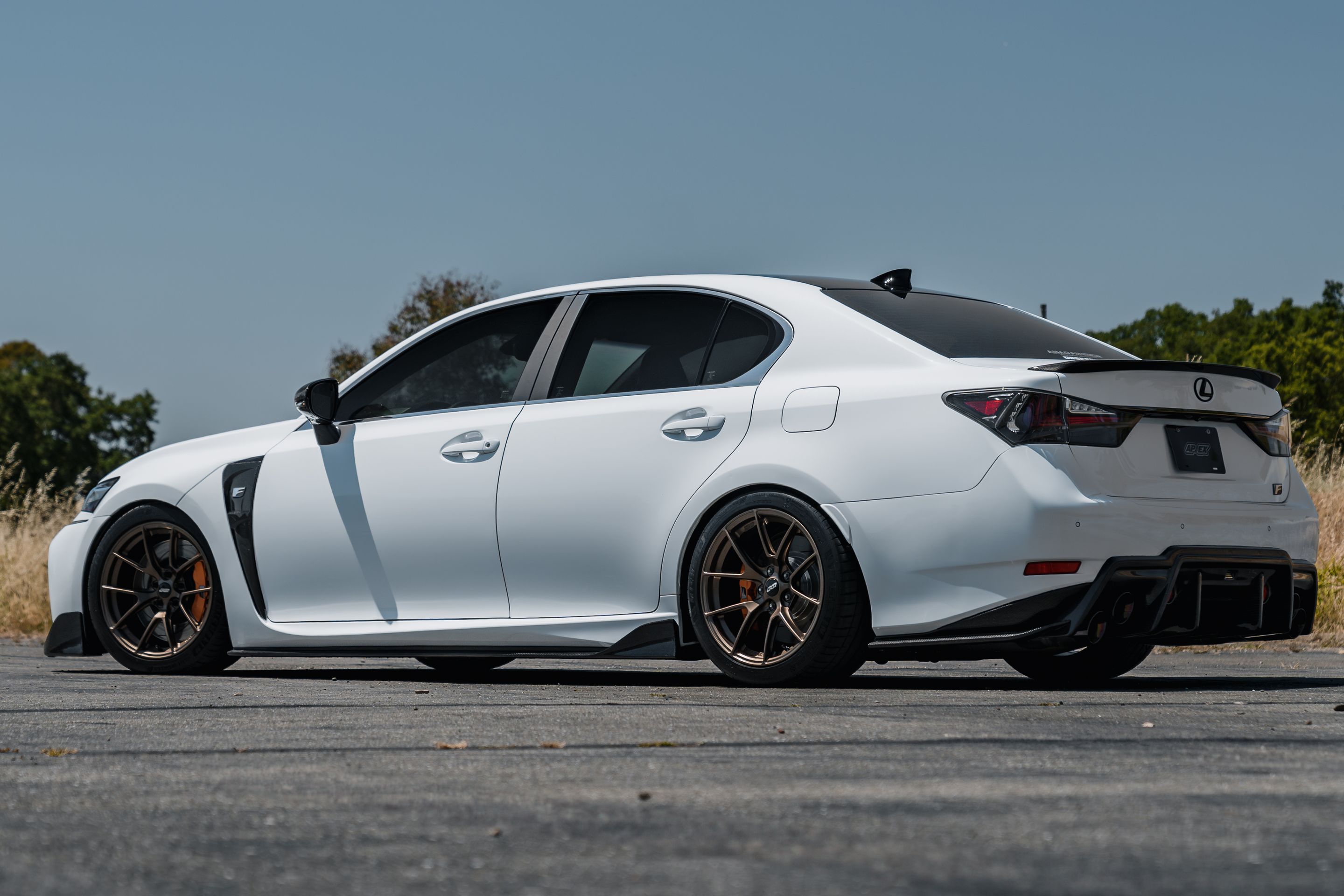 White Lexus URL10 GS-F with 18" VS-5RS Apex wheels in Satin Bronze