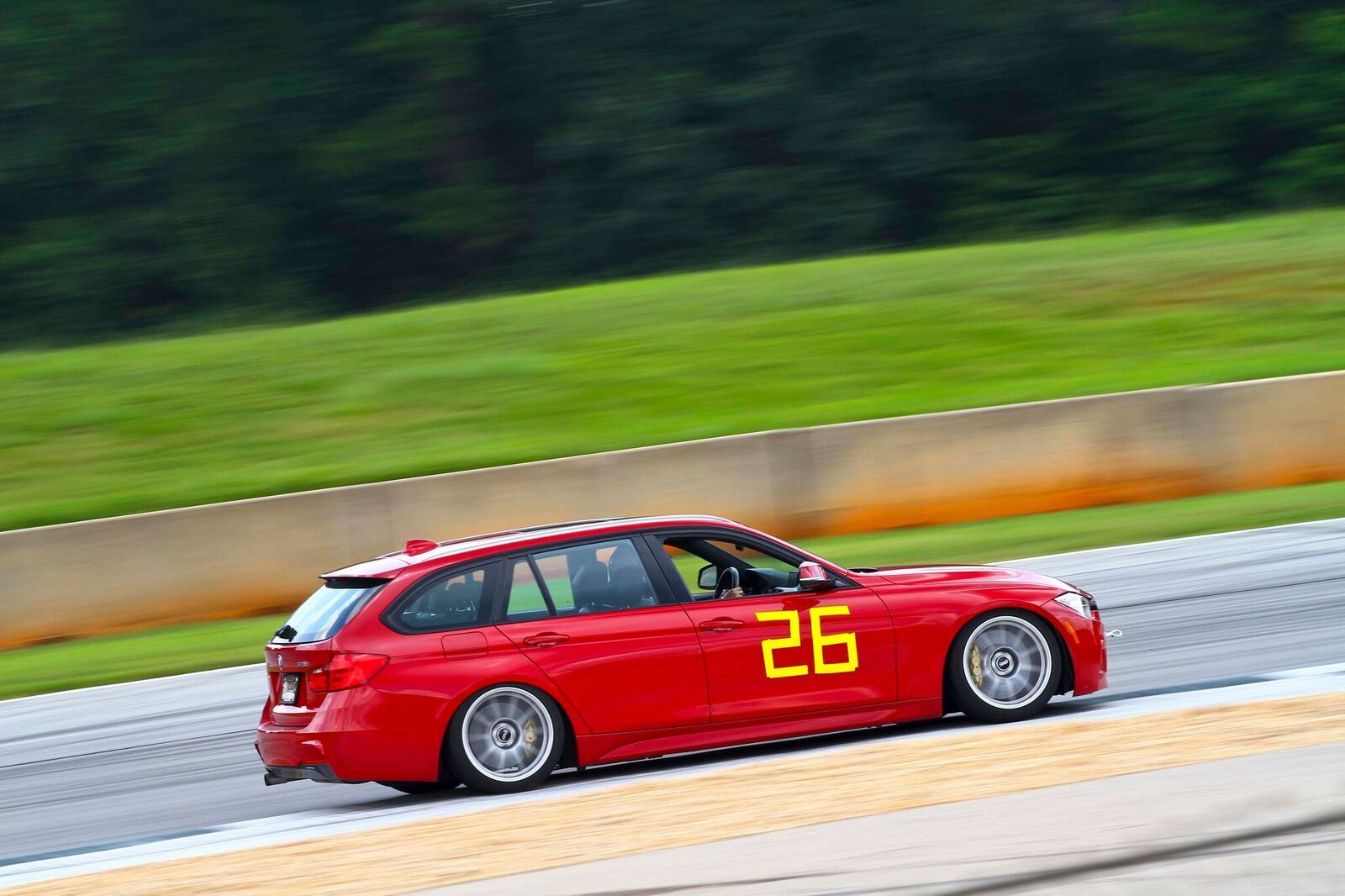 Red BMW F31 Wagon 3 Series with 18" SM-10 Apex wheels in Race Silver