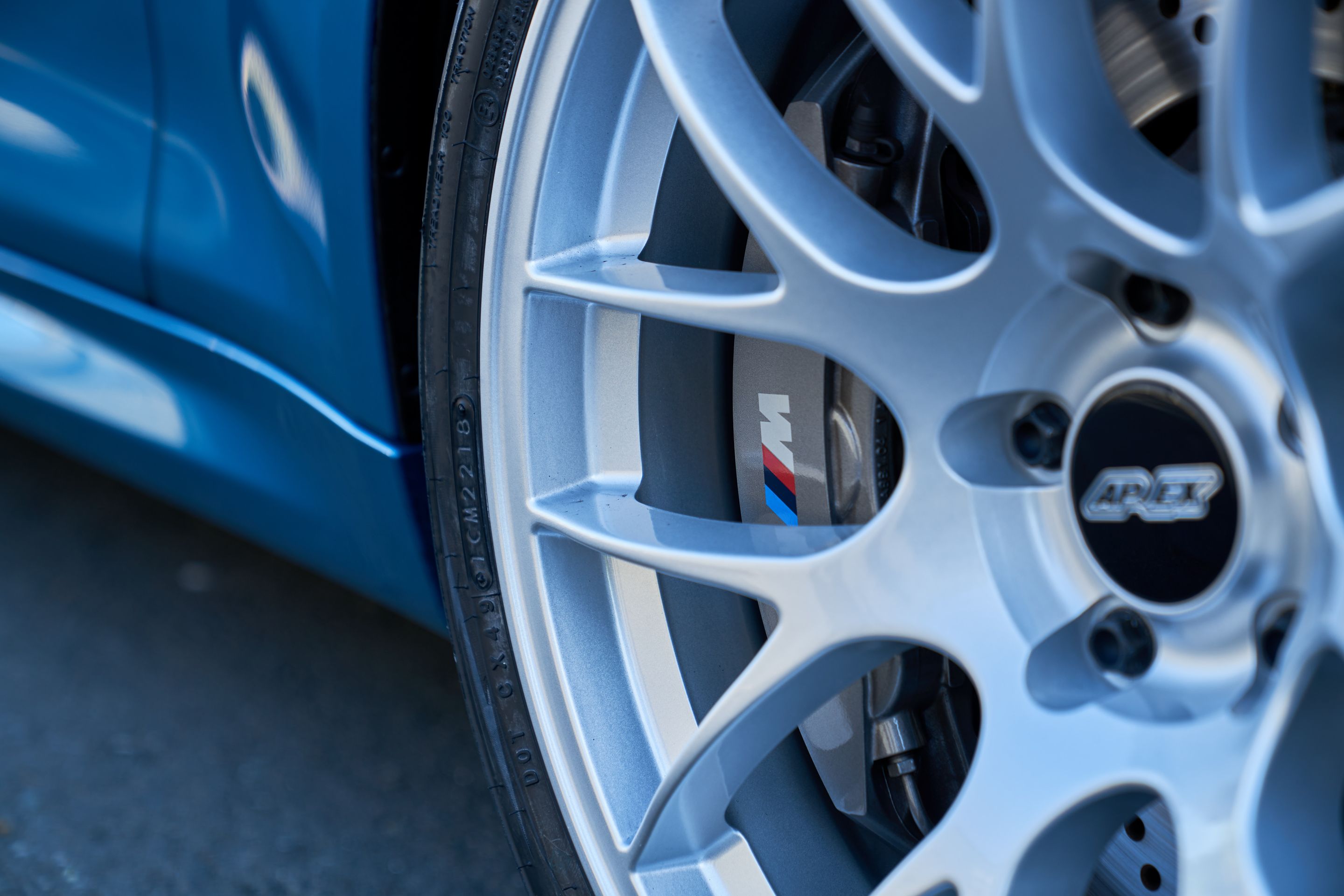 Blue BMW F87 M2 with 19" EC-7 Apex wheels in Race Silver