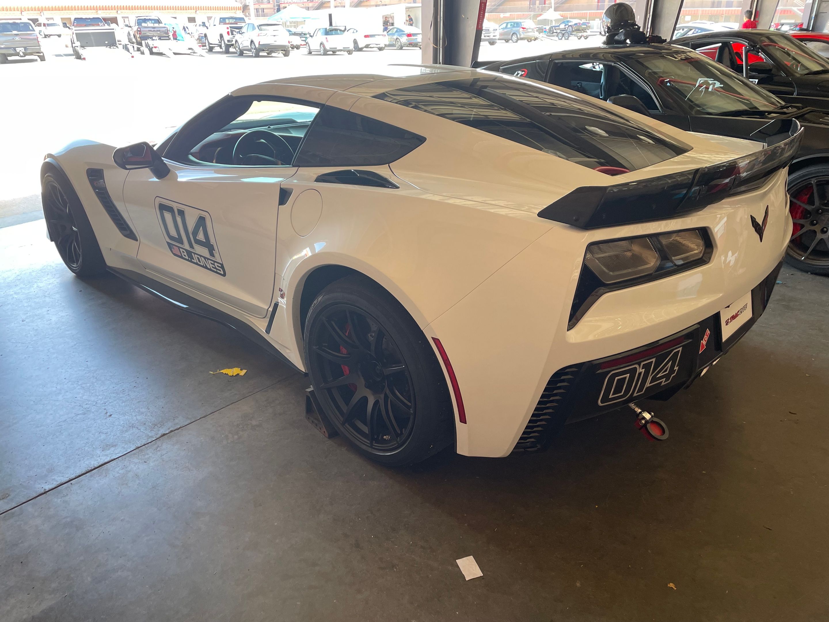 White Chevrolet C7 Corvette Z06 with 19" SM-10 Apex wheels in Satin Black