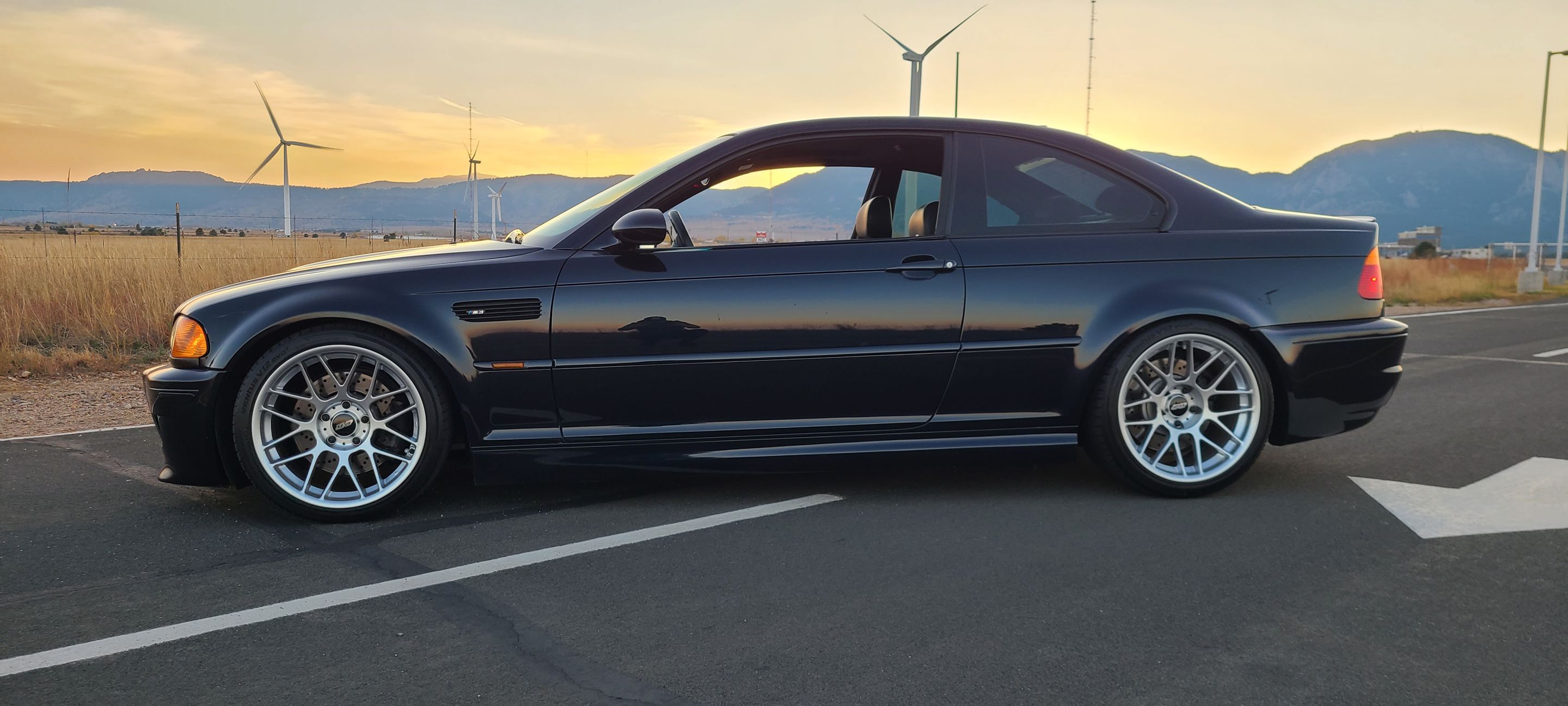 Black BMW E46 M3 with 18" ARC-8 Apex wheels in Hyper Silver
