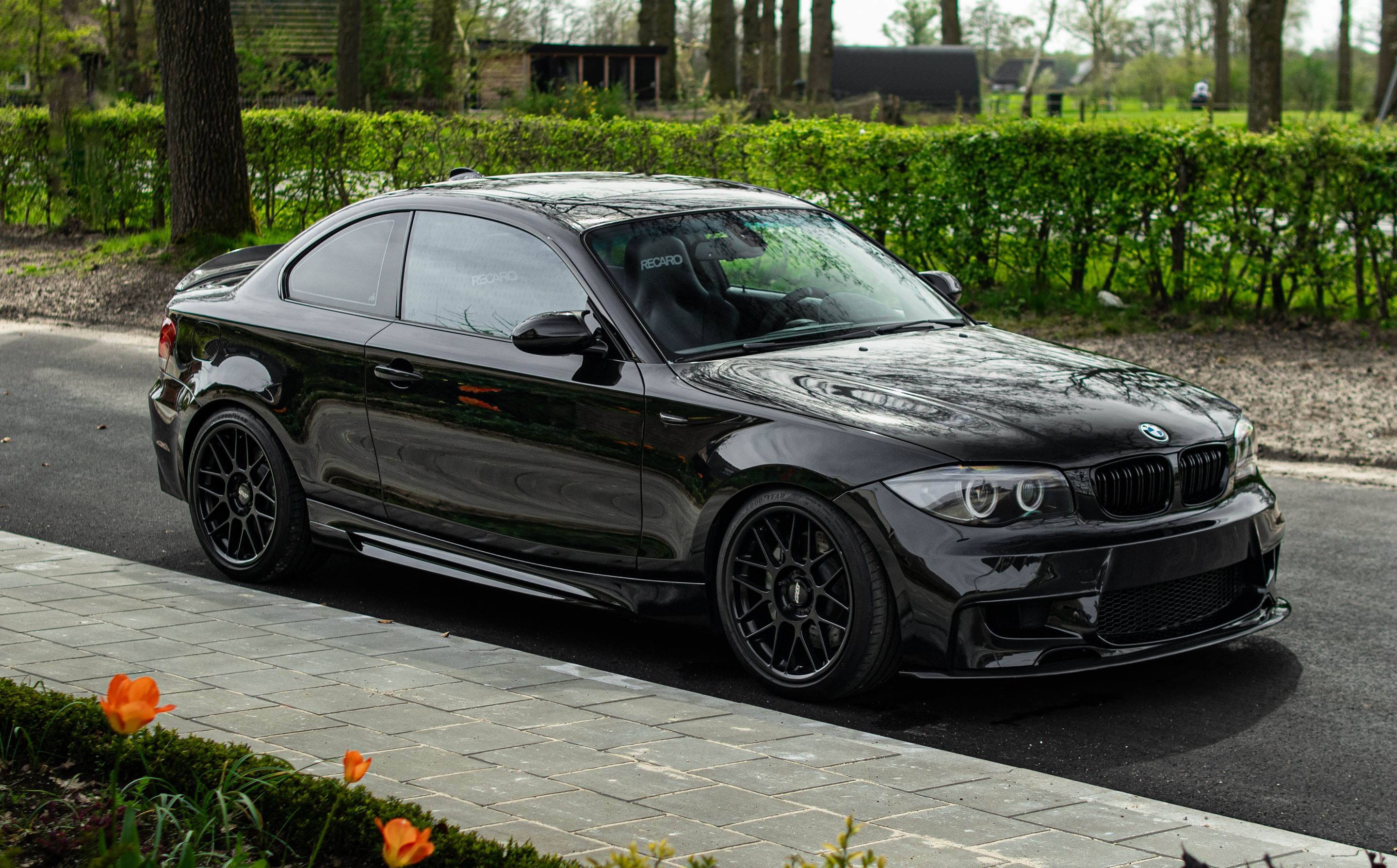 Black BMW E82 Coupe 1 Series with 18" ARC-8 Apex wheels in Satin Black