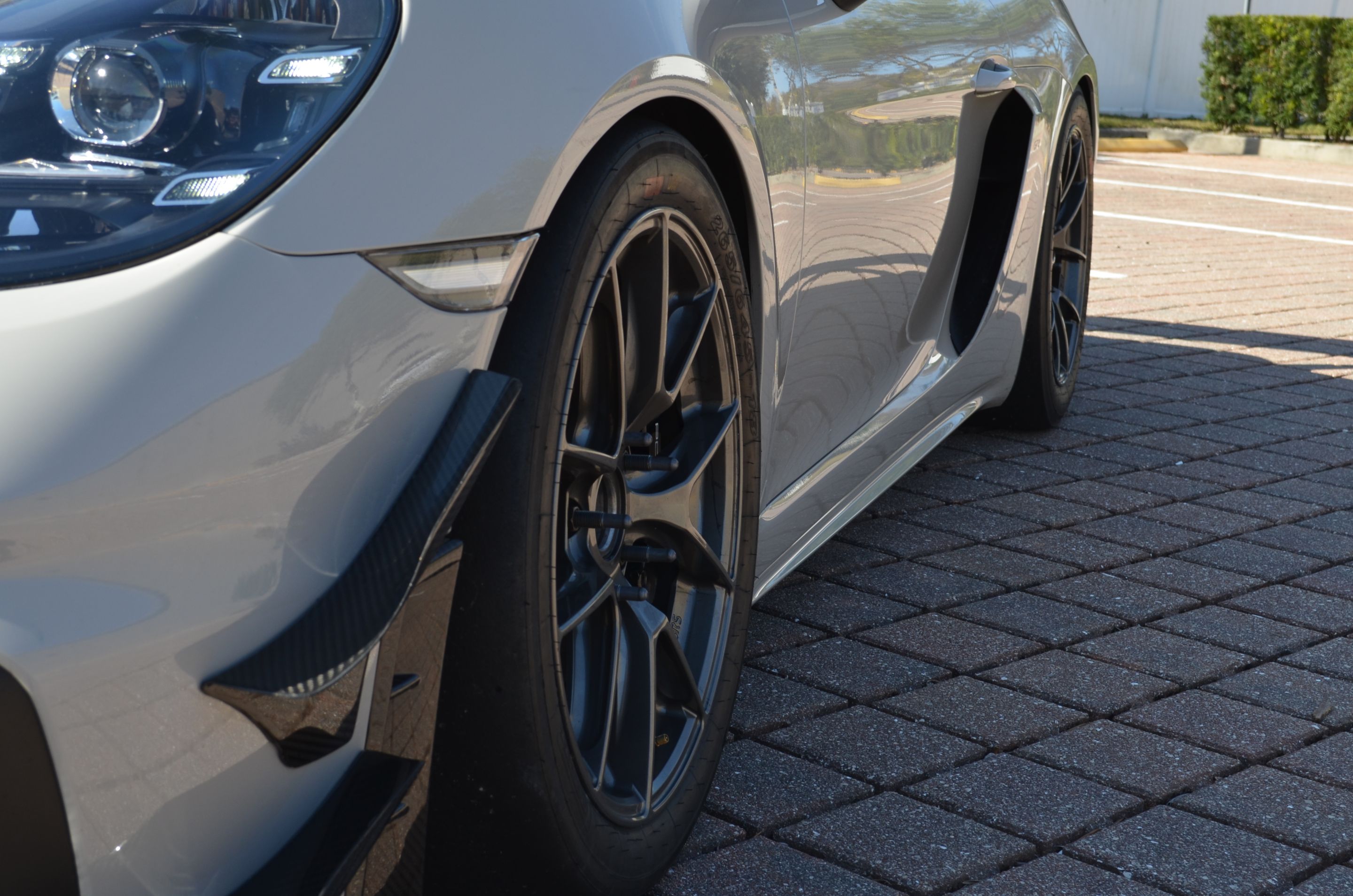 Grey Porsche 718 Cayman GT4 with 18" VS-5RS Apex wheels in Anthracite