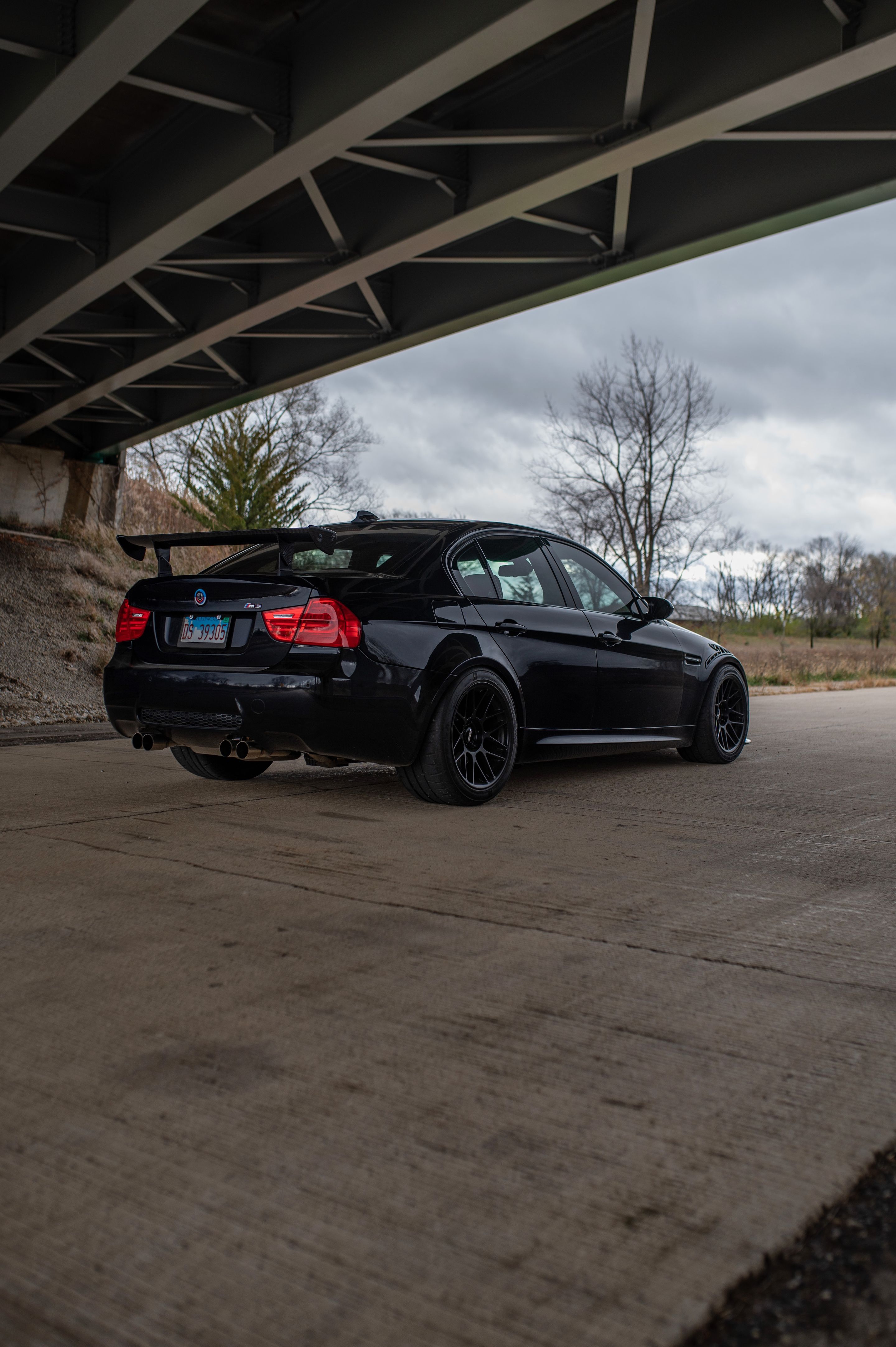 Black BMW E90 Sedan M3 with 18" ARC-8 Apex wheels in Satin Black