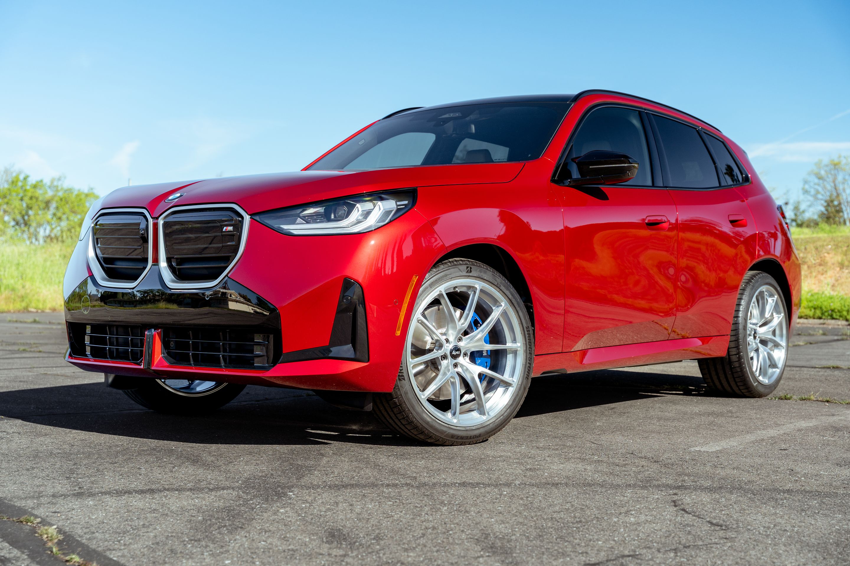 Red BMW G45 X3 with 21" VS-5RX Apex wheels in Brushed Clear