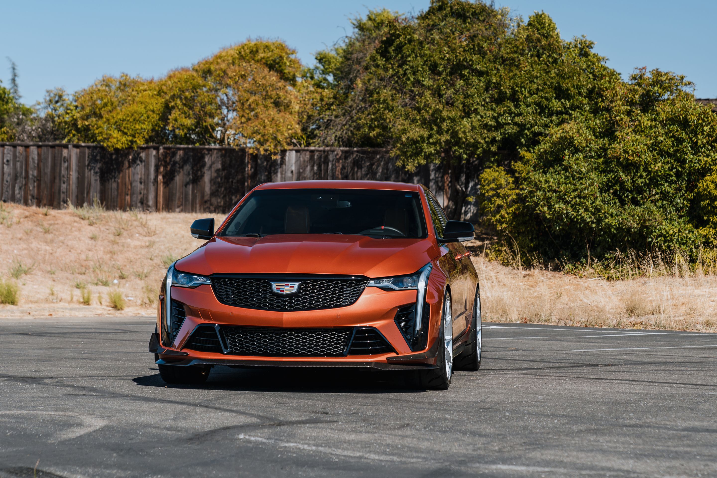 Orange Cadillac CT4-V Blackwing with 19" VS-5RS Apex wheels in Brushed Clear