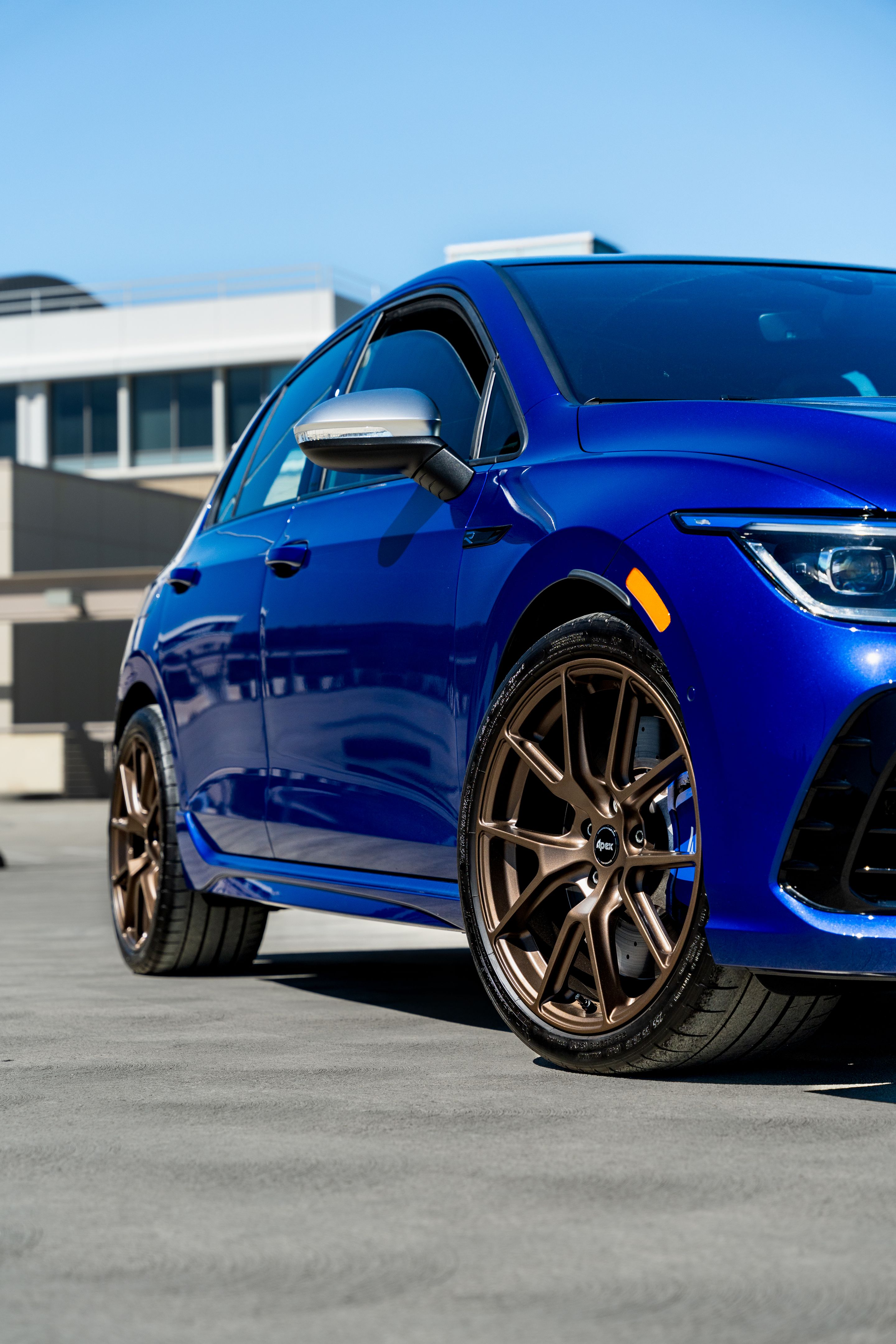 Blue VW MK8 Golf R with 18" VS-5 Apex wheels in Satin Bronze