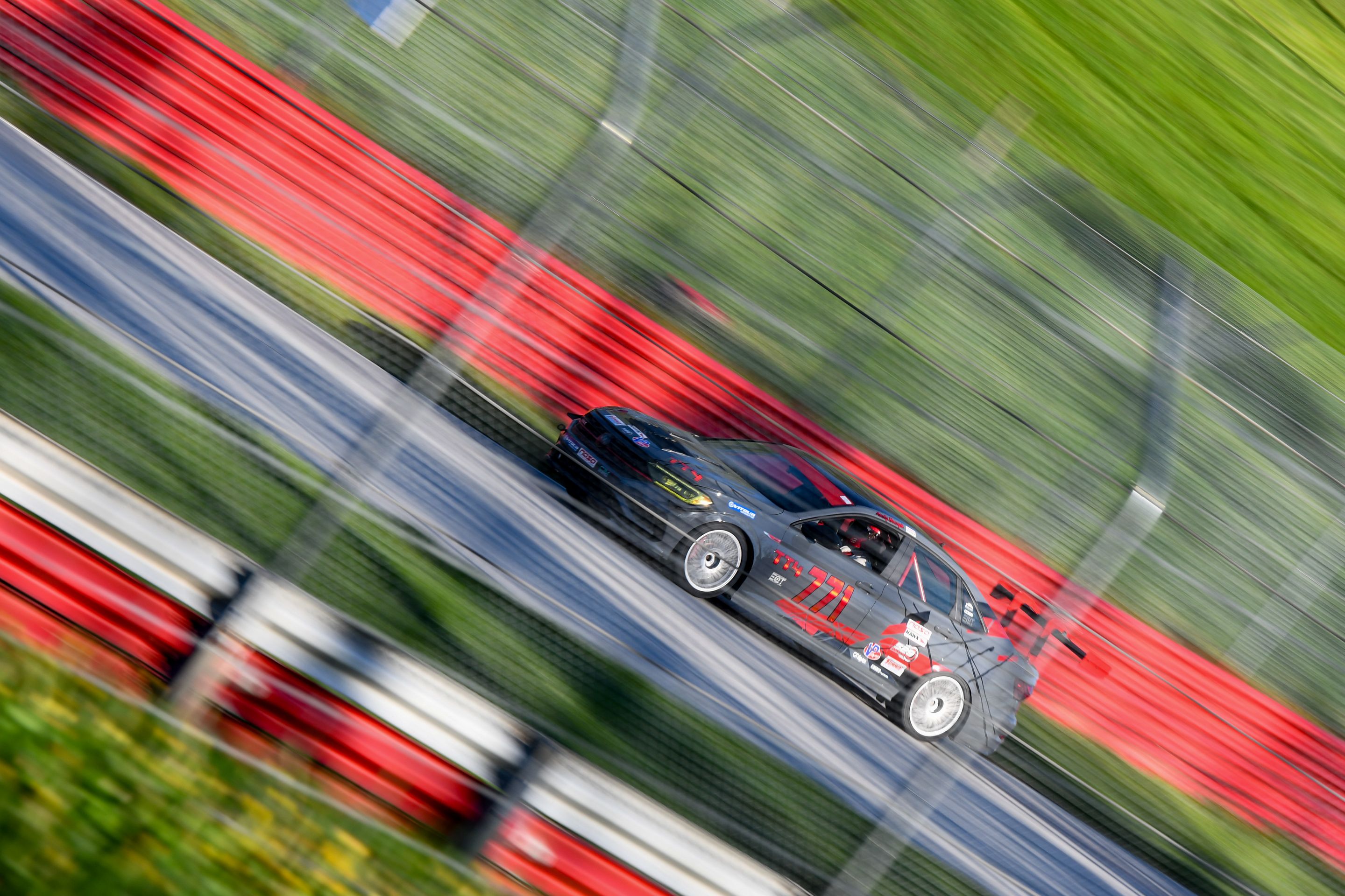 Race Livery VW MK7 GLI with 18" TC-10RT Apex wheels in Race Silver
