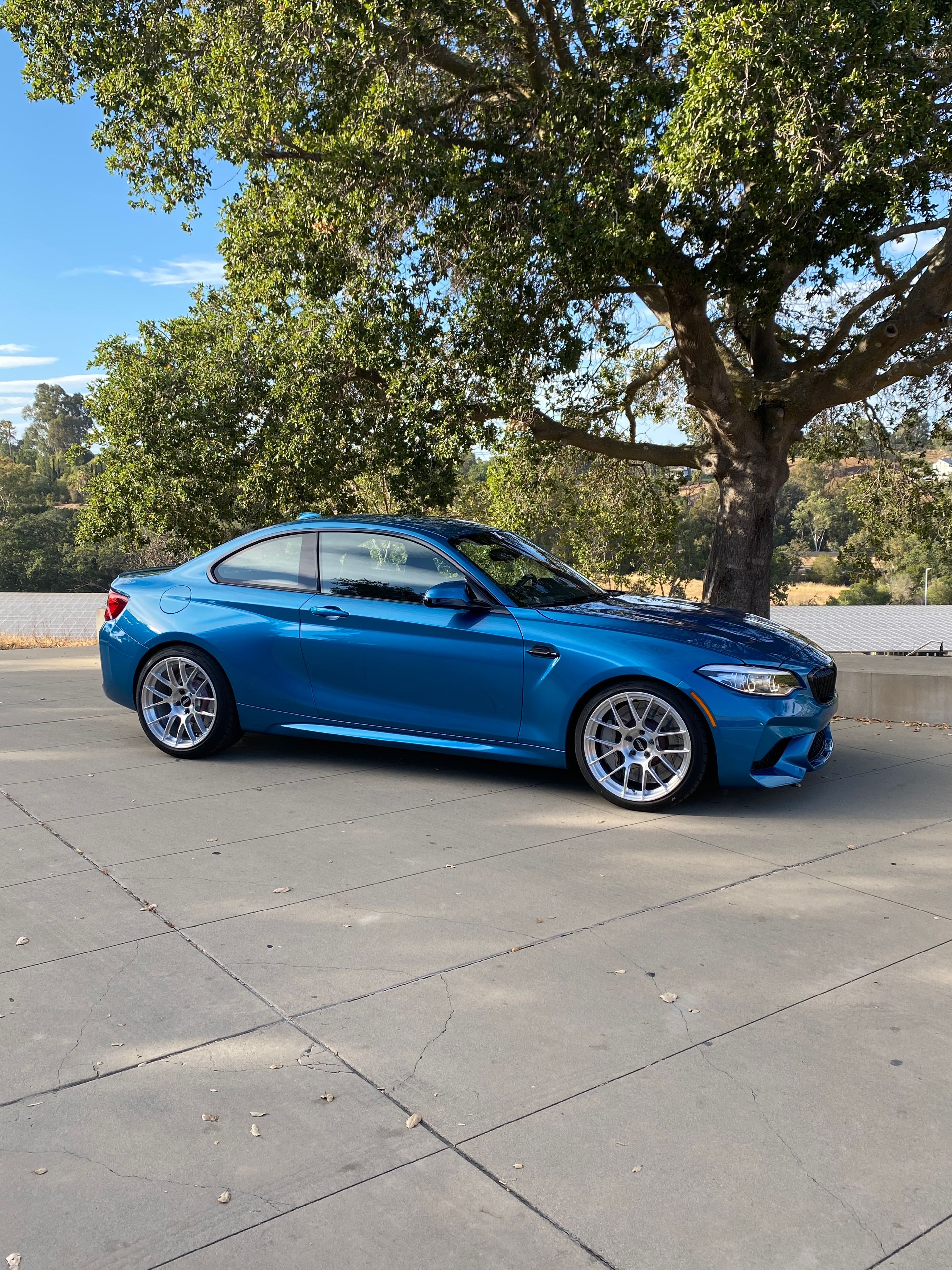 Blue BMW F87 M2 with 19" EC-7RS Apex wheels in Brushed Clear