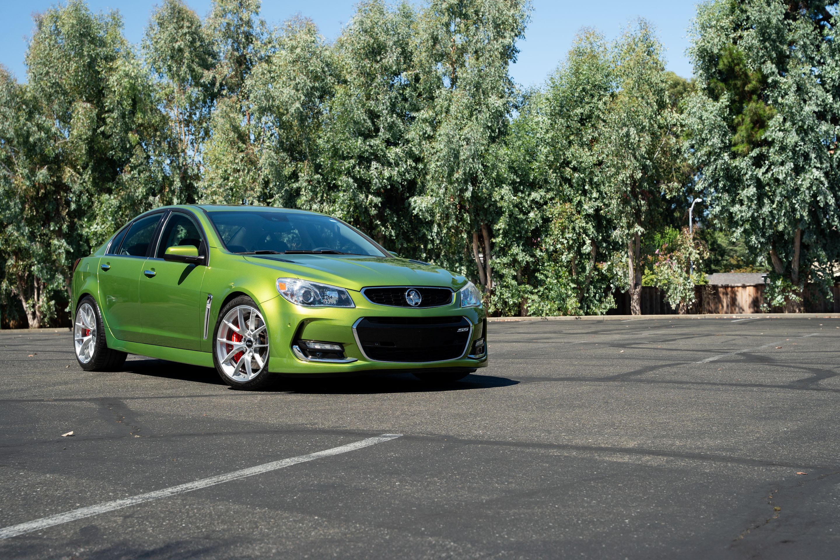 Green Chevrolet SS with 19" VS-5RS Apex wheels in Brushed Clear