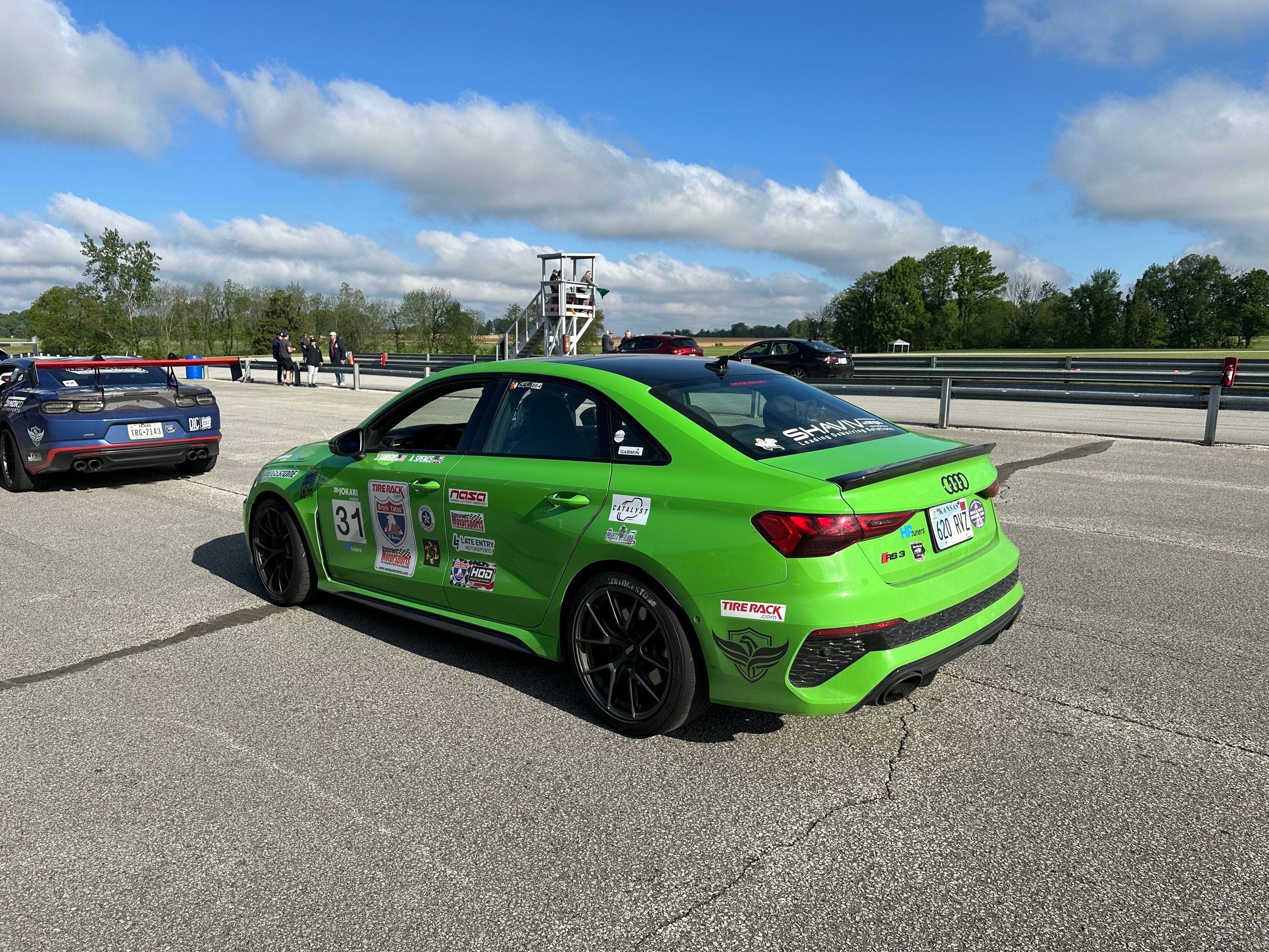 Green Audi 8Y RS 3 with 18" VS-5RS Apex wheels in Anthracite
