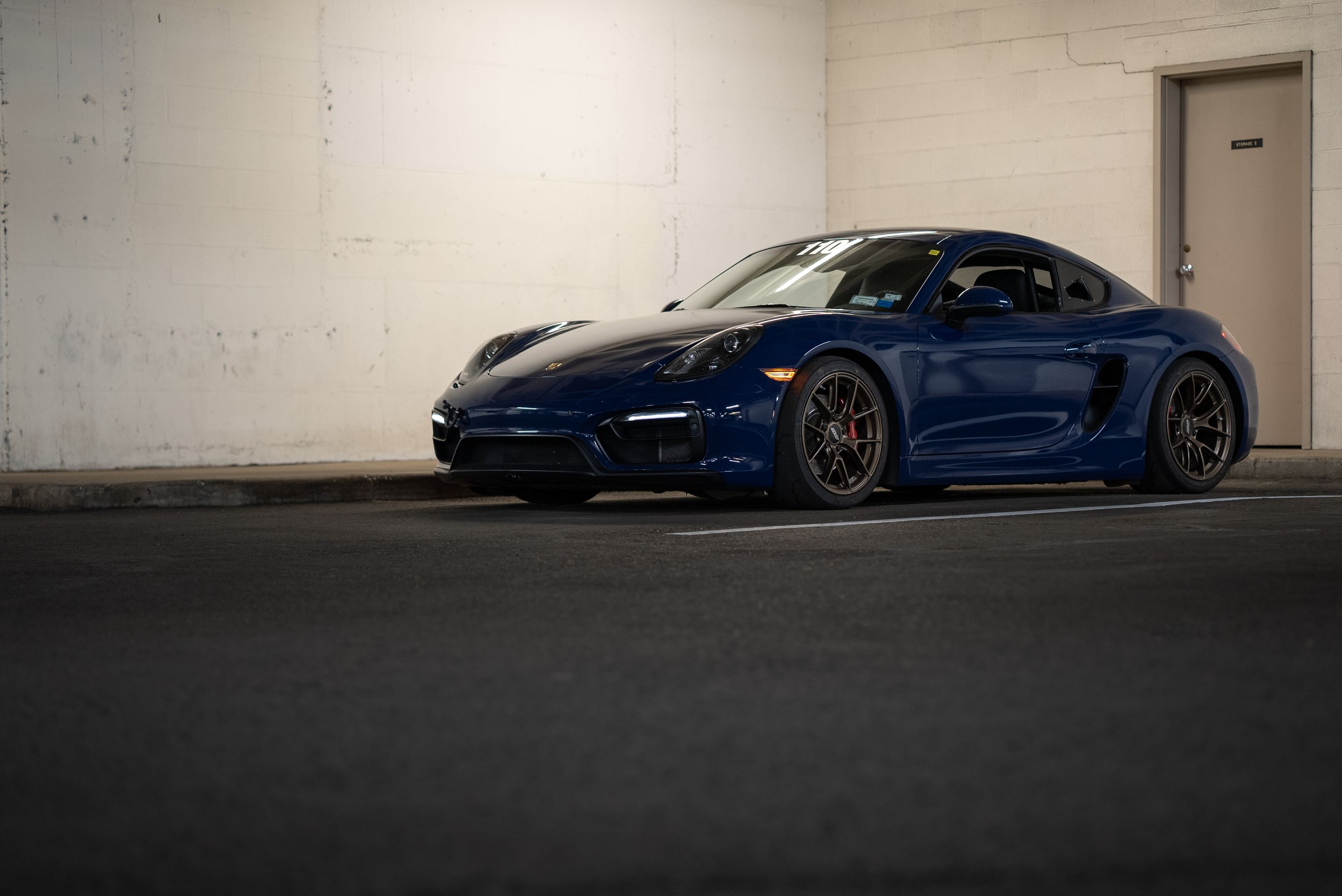 Blue Porsche 981 Cayman GTS with 18" VS-5RS Apex wheels in Satin Bronze