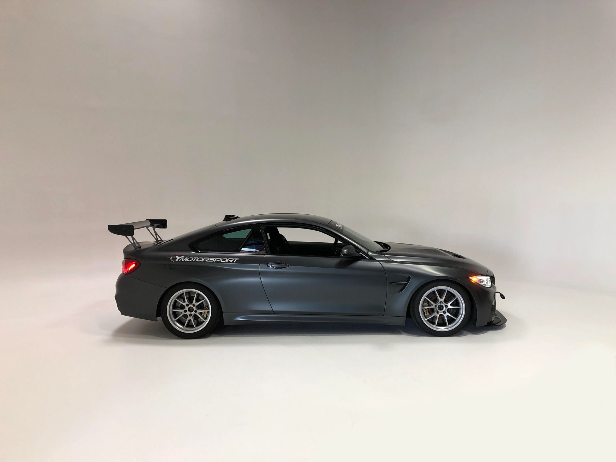 Grey BMW F82 Coupe M4 with 18" FL-5 Apex wheels in Race Silver