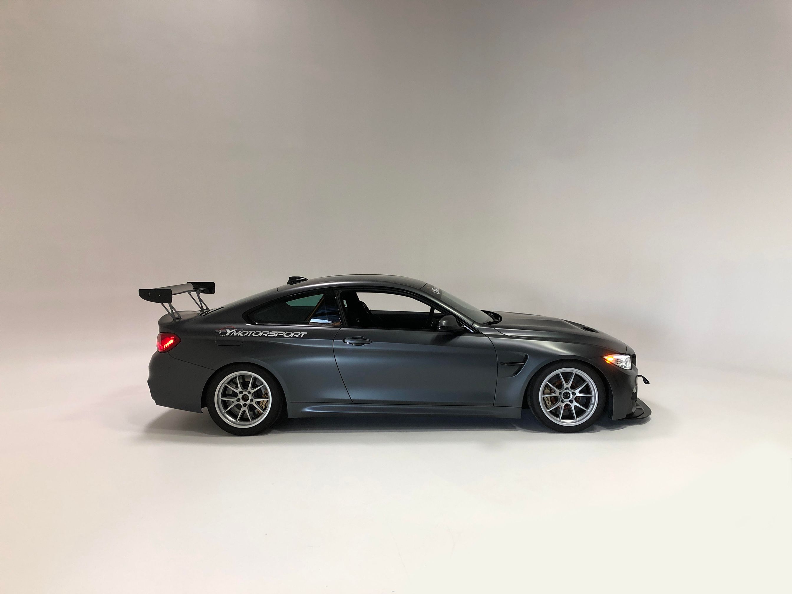 Grey BMW F82 Coupe M4 with 18" FL-5 Apex wheels in Race Silver