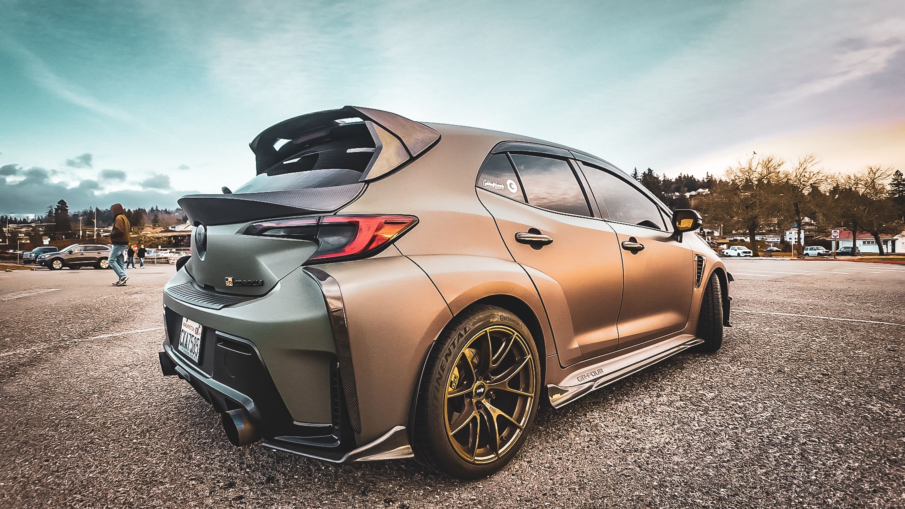 Green Toyota GR Corolla with 18" VS-5RS Apex wheels in Satin Bronze