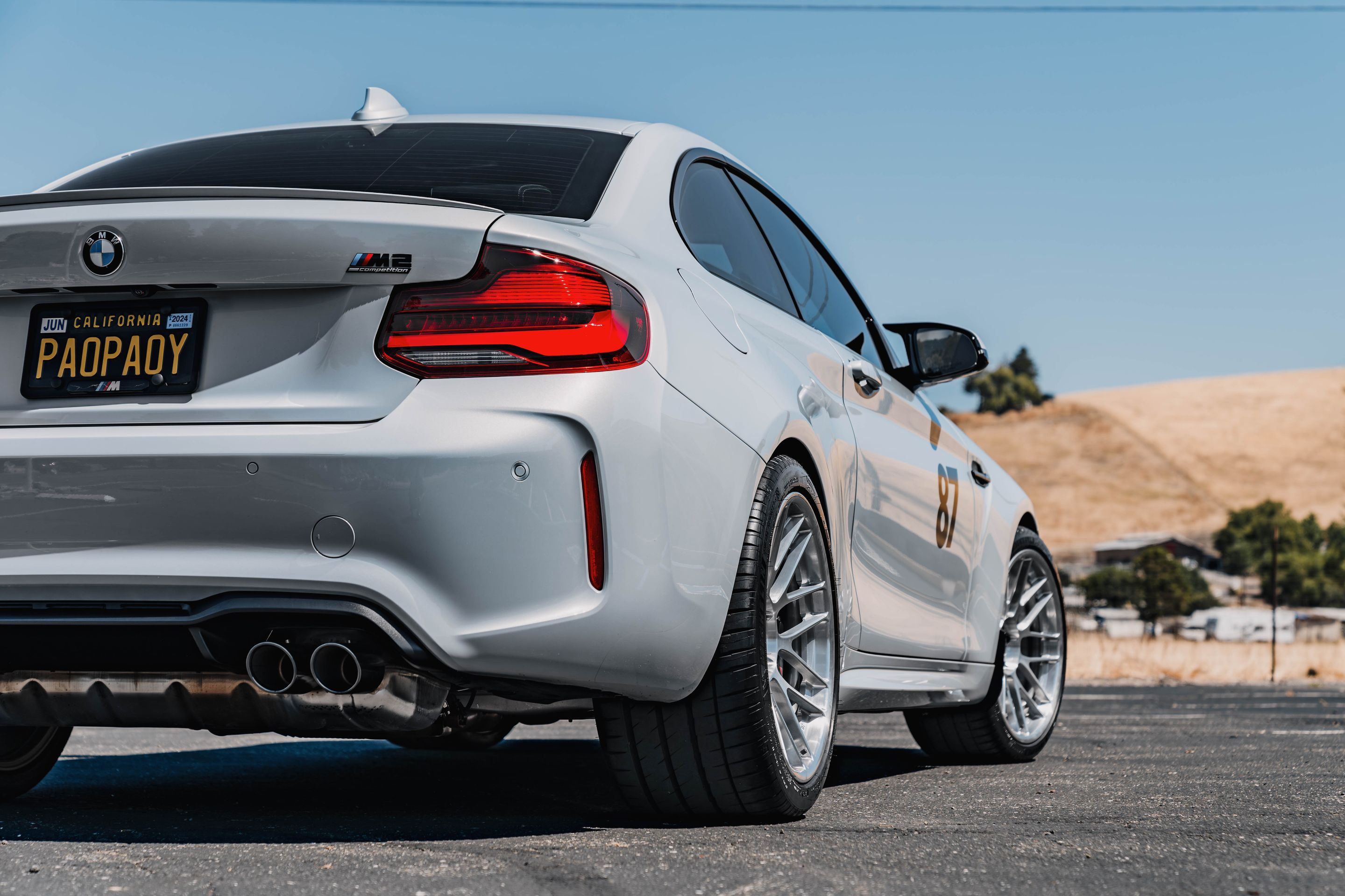 Silver BMW F87 M2 with 19" ARC-8RT Apex wheels in Brushed Clear