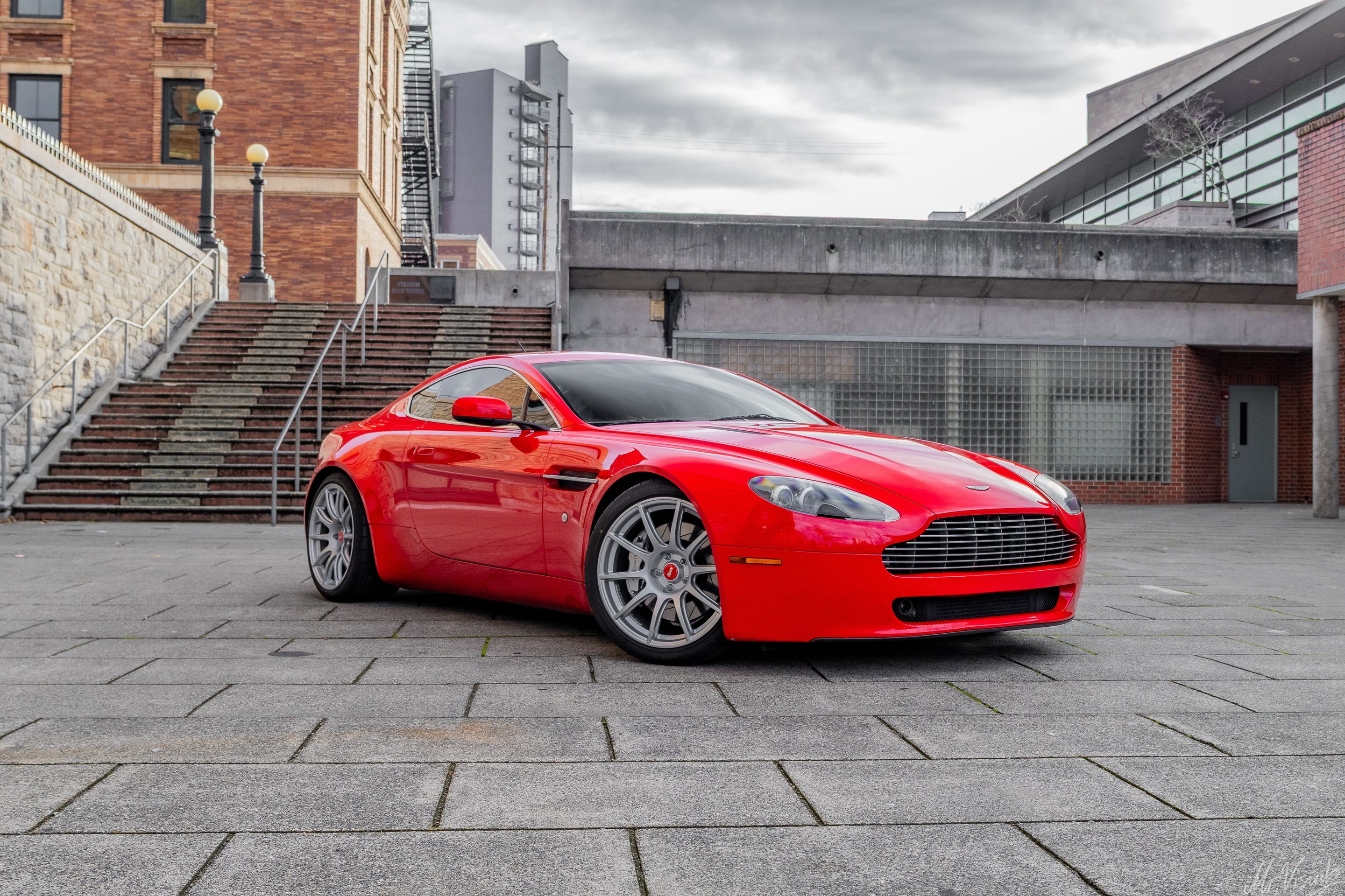 Red Aston Martin V8/V12 Vantage with 19" SM-10 Apex wheels in Race Silver