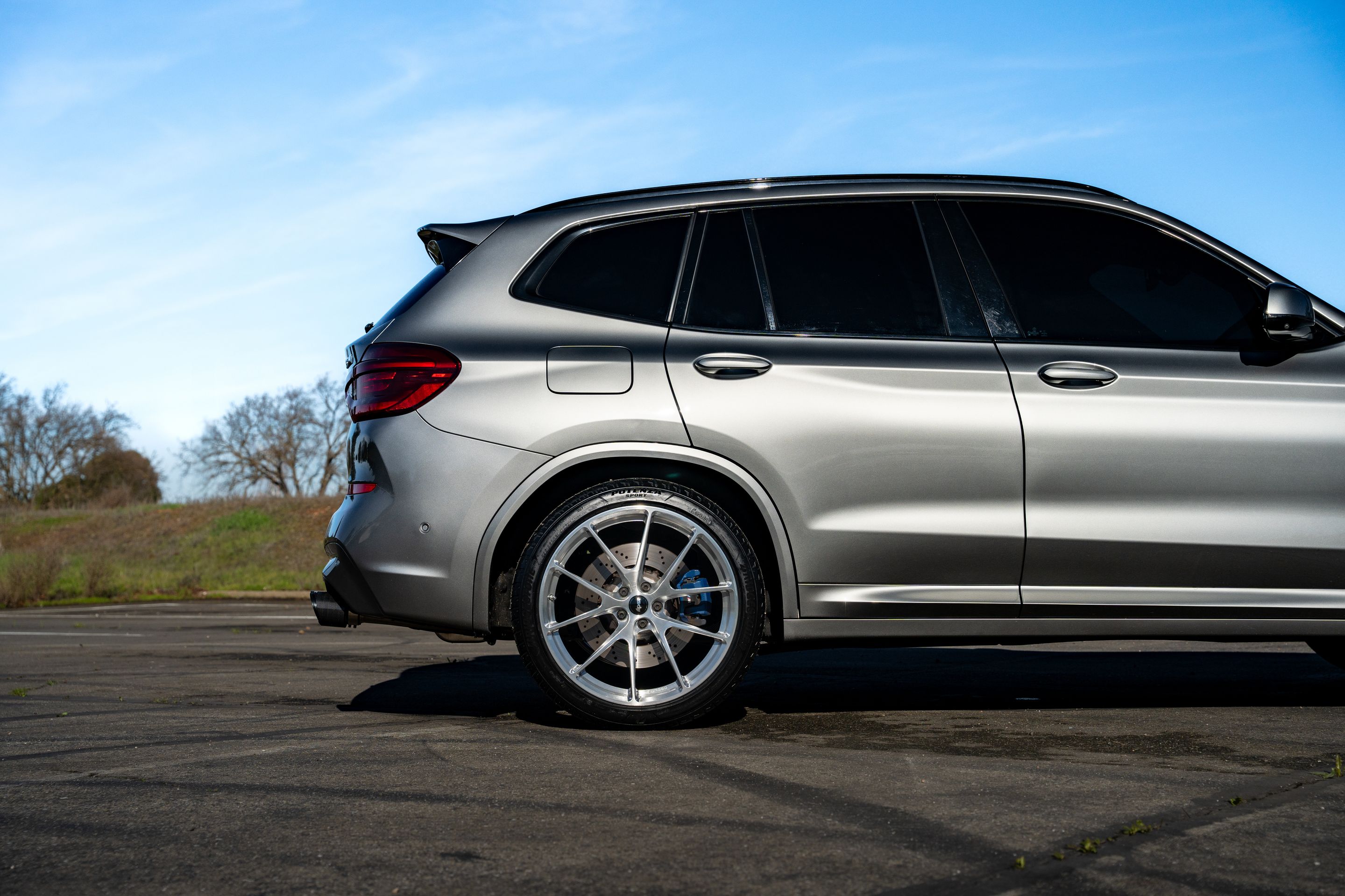 Silver BMW F97 X3M with 21" VS-5RX Apex wheels in Brushed Clear