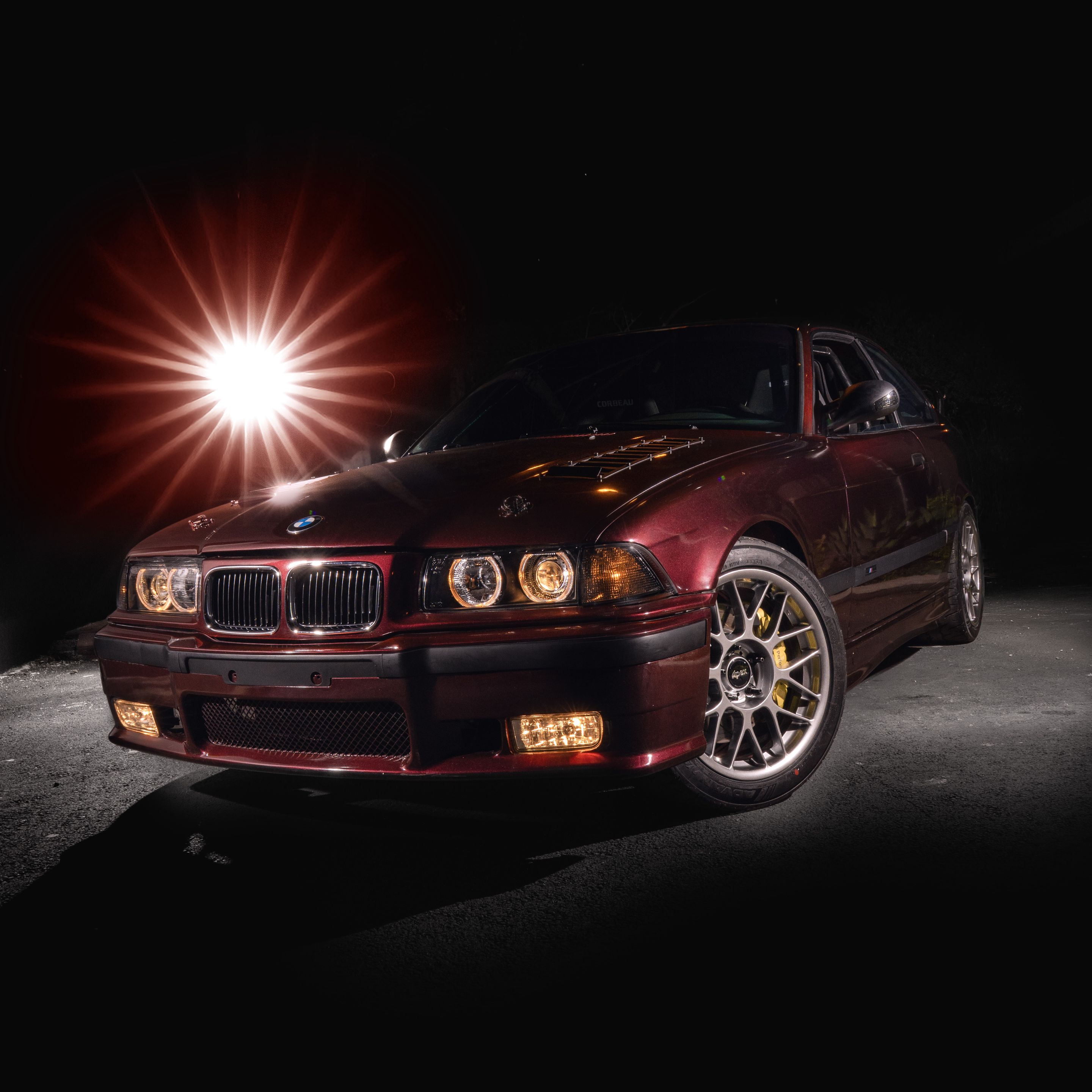 Red BMW E36 3 Series with 17" ARC-8 Apex wheels in Hyper Black