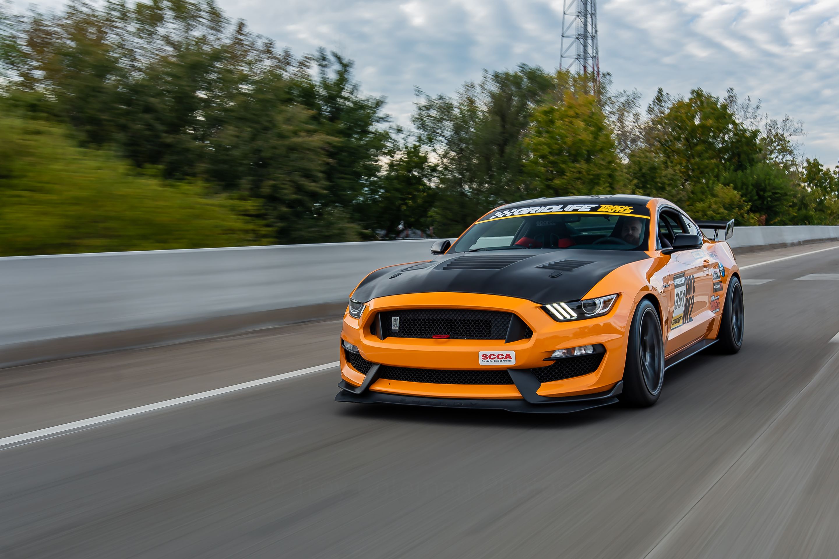 Orange Ford S550 Mustang GT350 with 19" SM-10RS Apex wheels in Anthracite