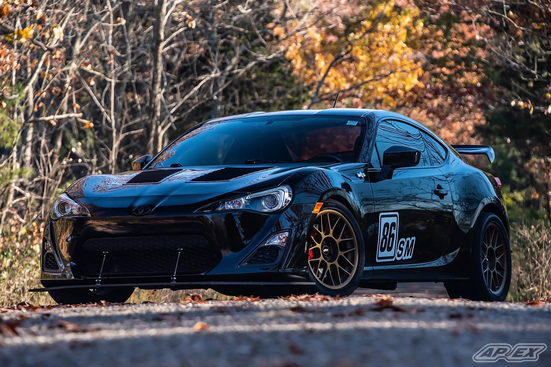 Black Scion FR-S with 17" ARC-8 Apex wheels in Satin Bronze