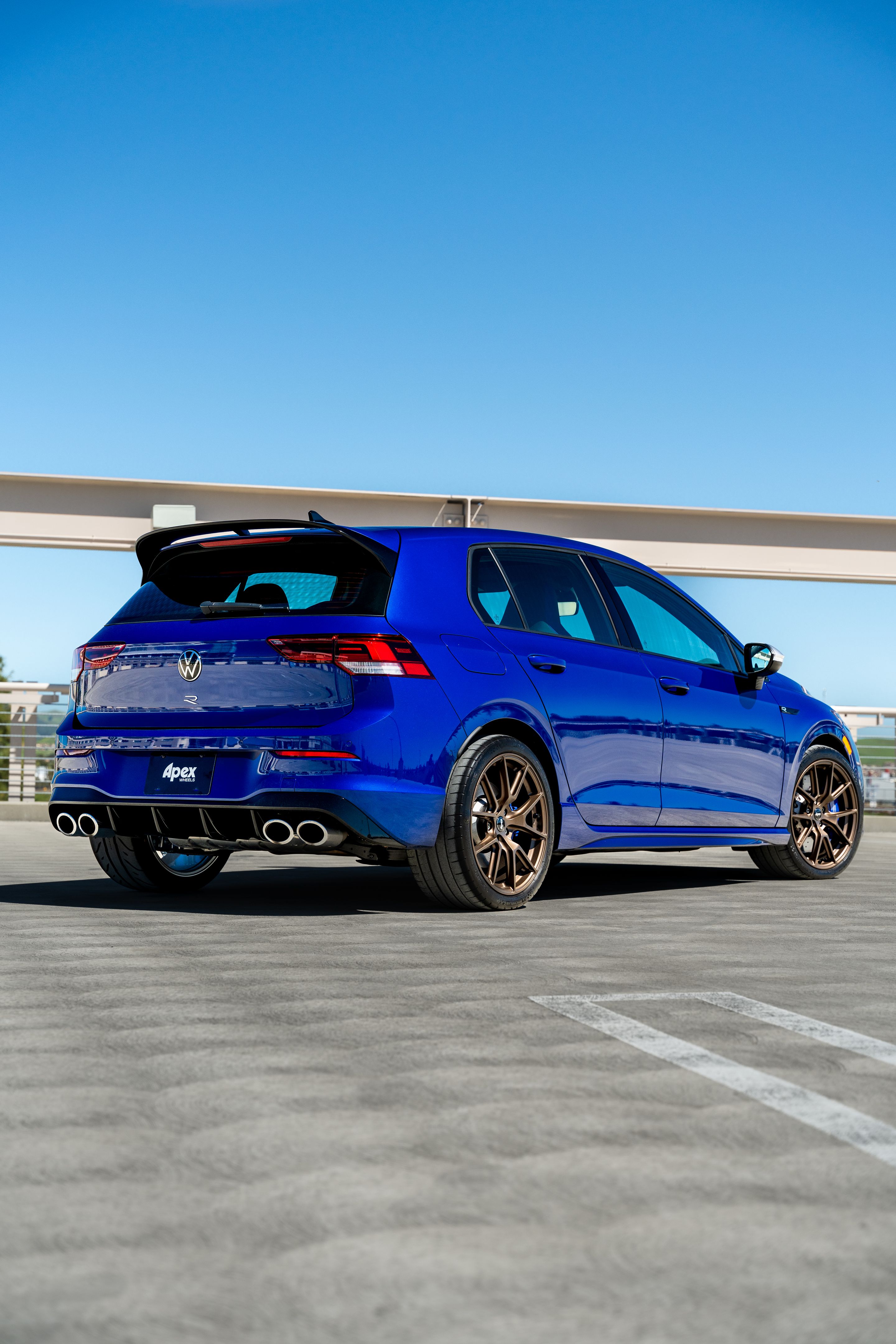 Blue VW MK8 Golf R with 18" VS-5 Apex wheels in Satin Bronze