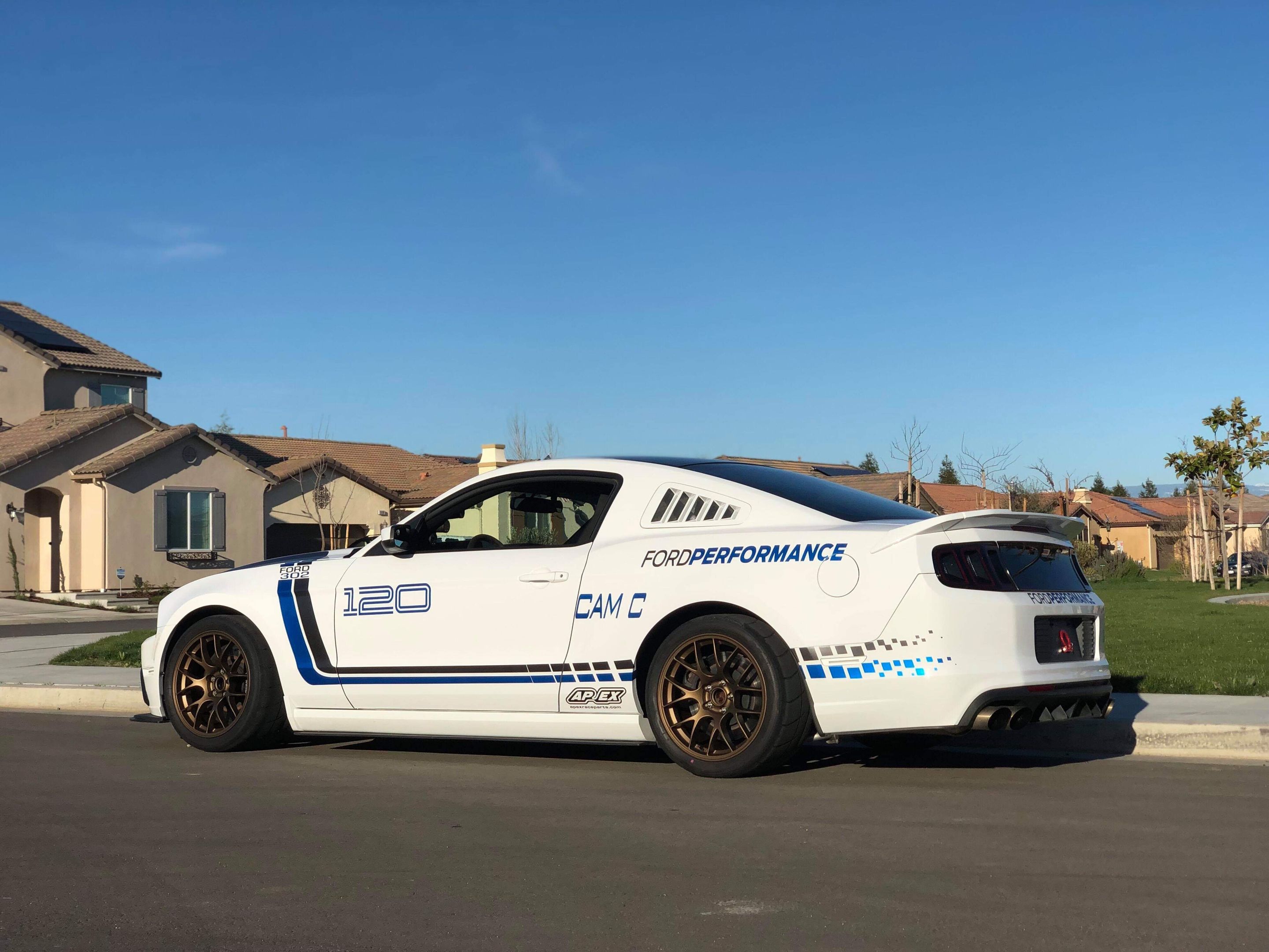 White Ford S197 Mustang GT with 18" EC-7 Apex wheels in Satin Bronze