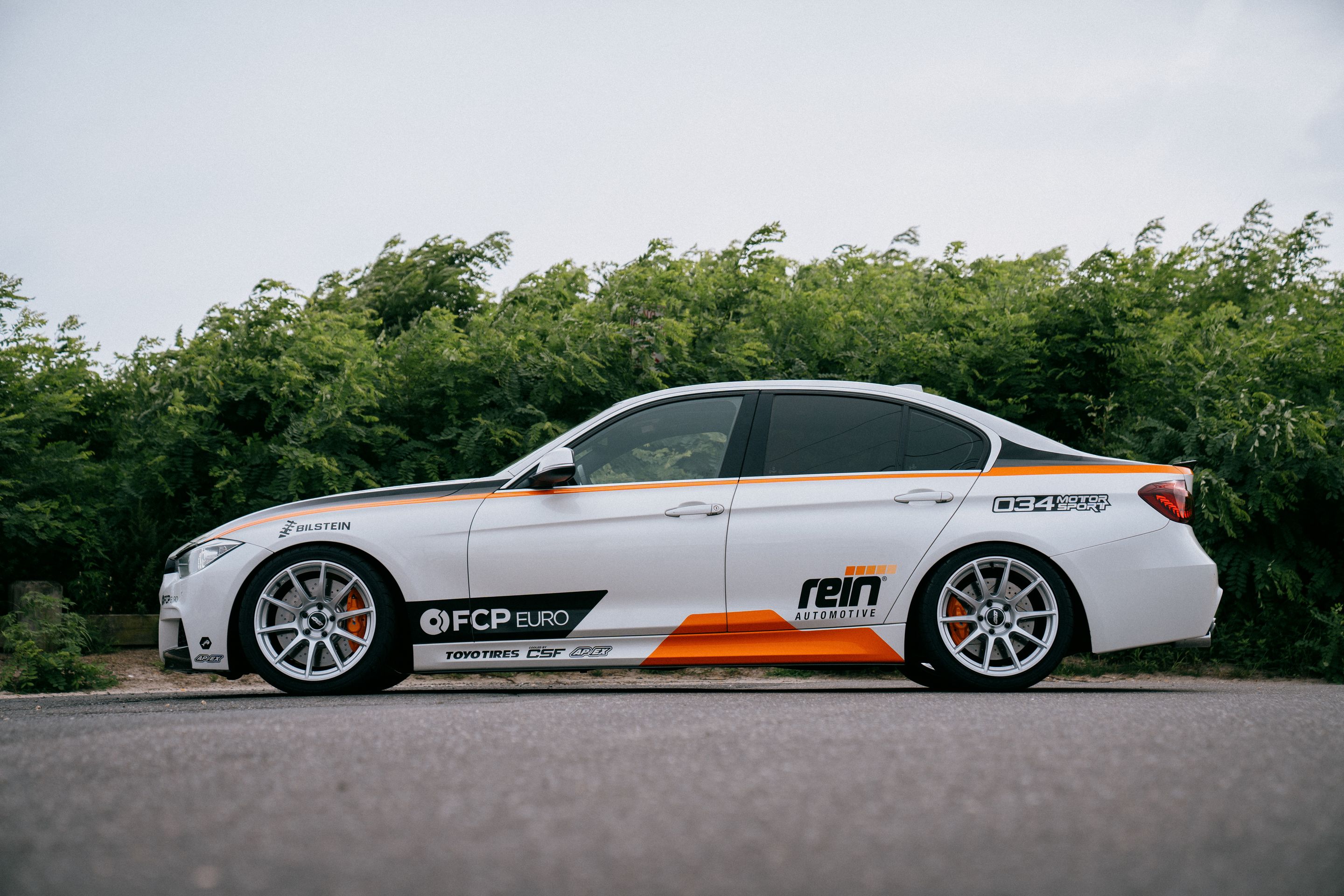 White BMW F30 Sedan 3 Series with 18" SM-10 Apex wheels in Race Silver