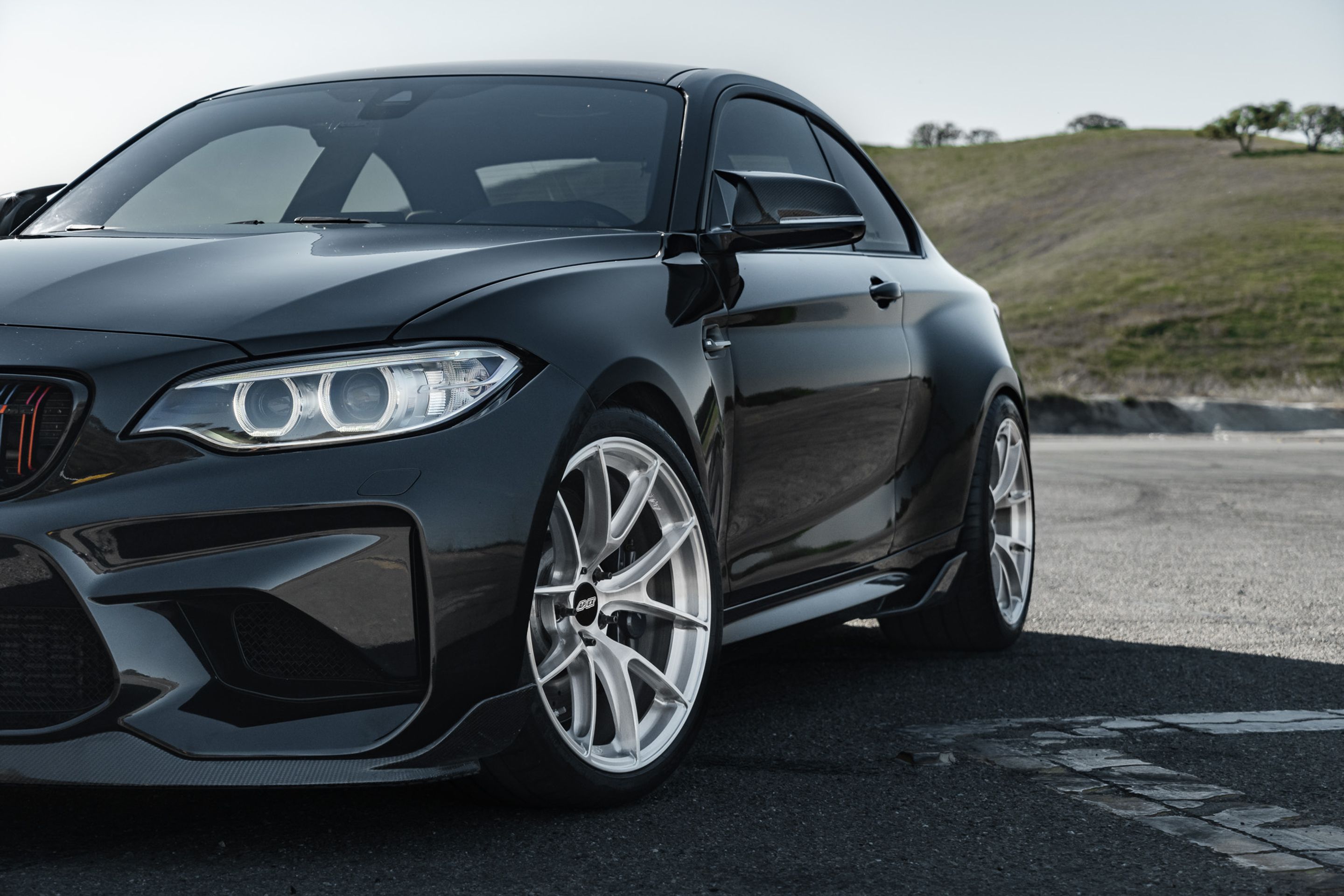 Black BMW F87 M2 with 19" VS-5RS Apex wheels in Brushed Clear