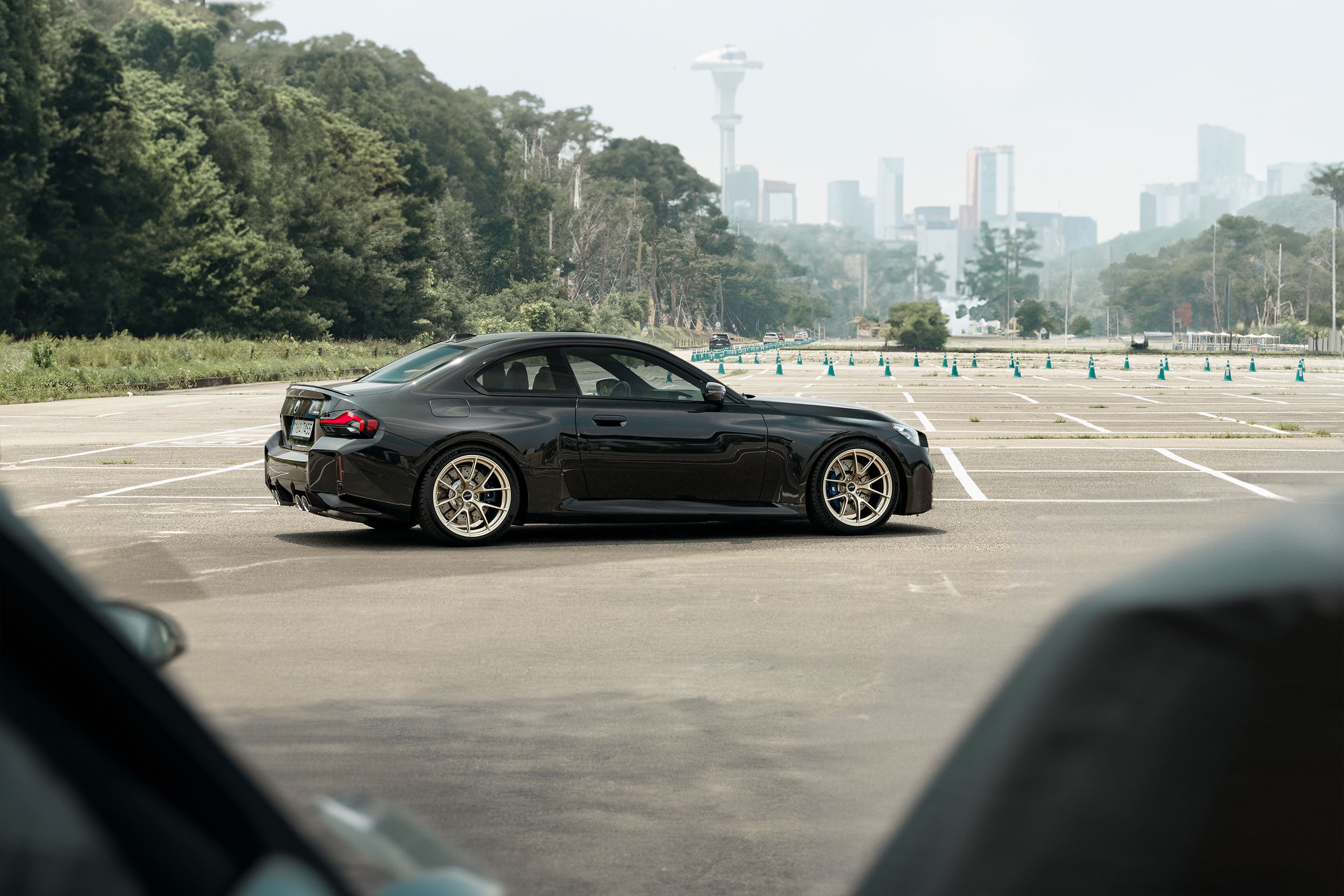 Black BMW G87 M2 with 19" VS-5RS Apex wheels in Motorsport Gold
