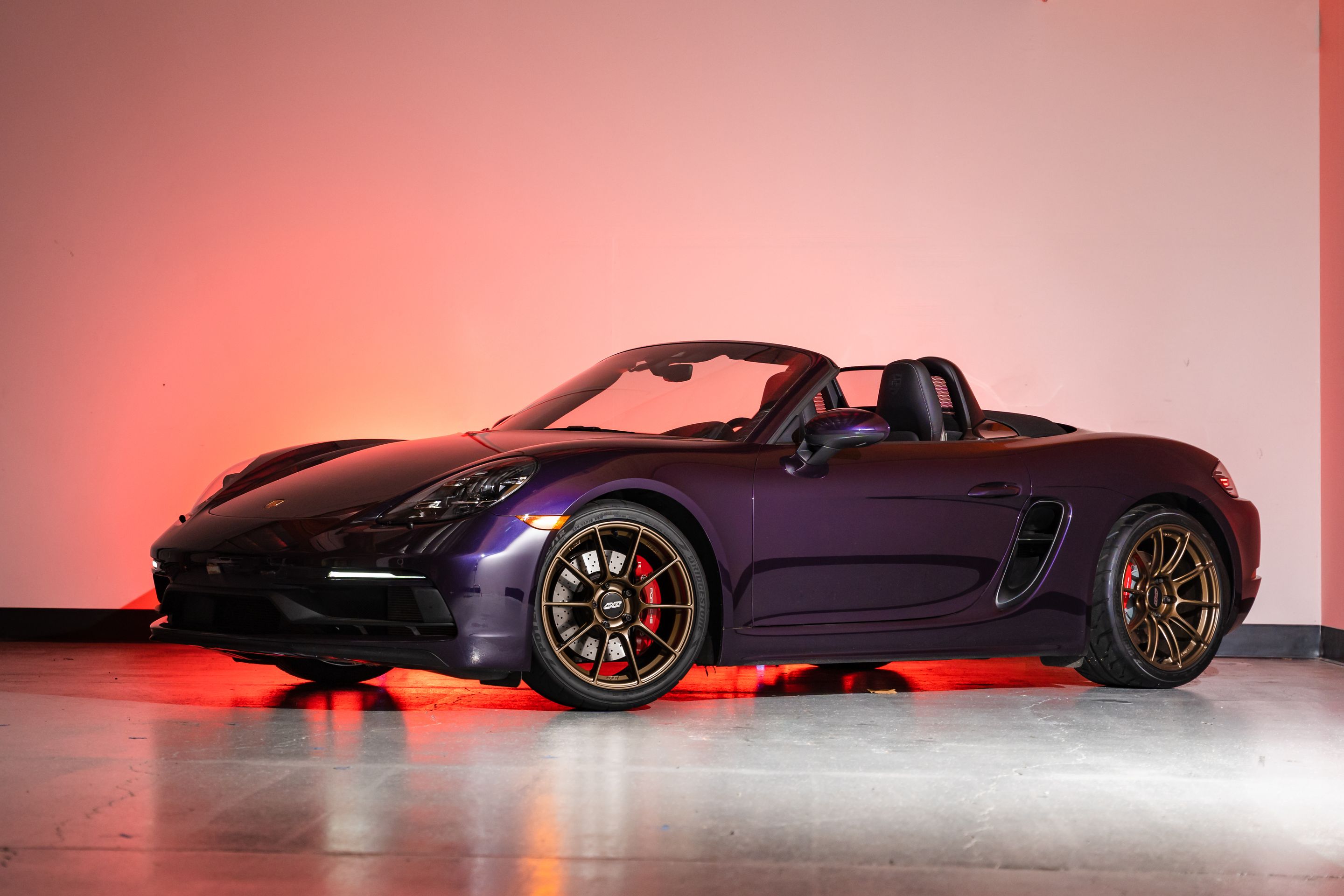 Purple Porsche 718 Boxster GTS 4.0L with 19" SM-10RS Apex wheels in Satin Bronze