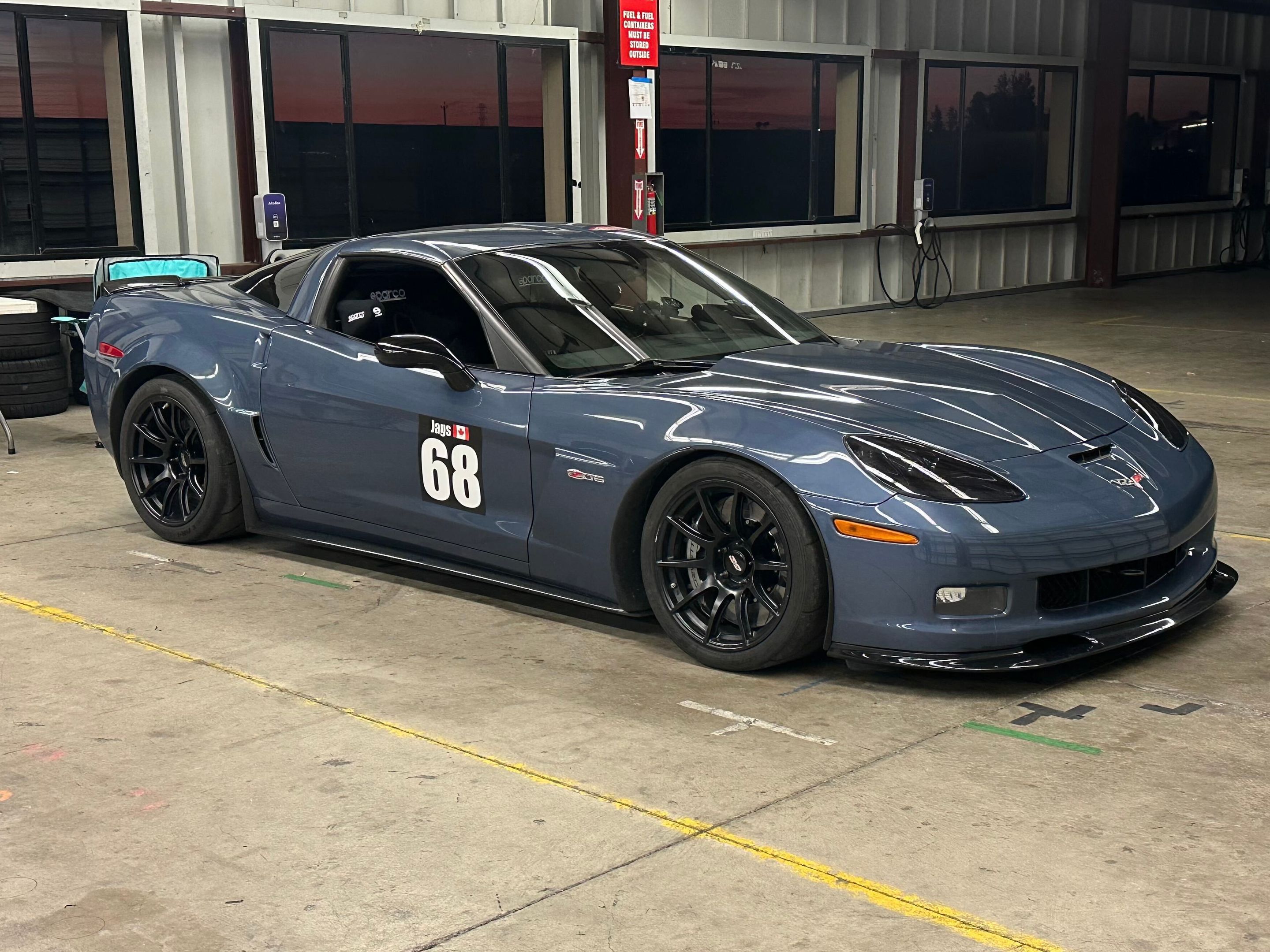 Blue Chevrolet C6 Corvette Z06 with 18" SM-10 Apex wheels in Satin Black