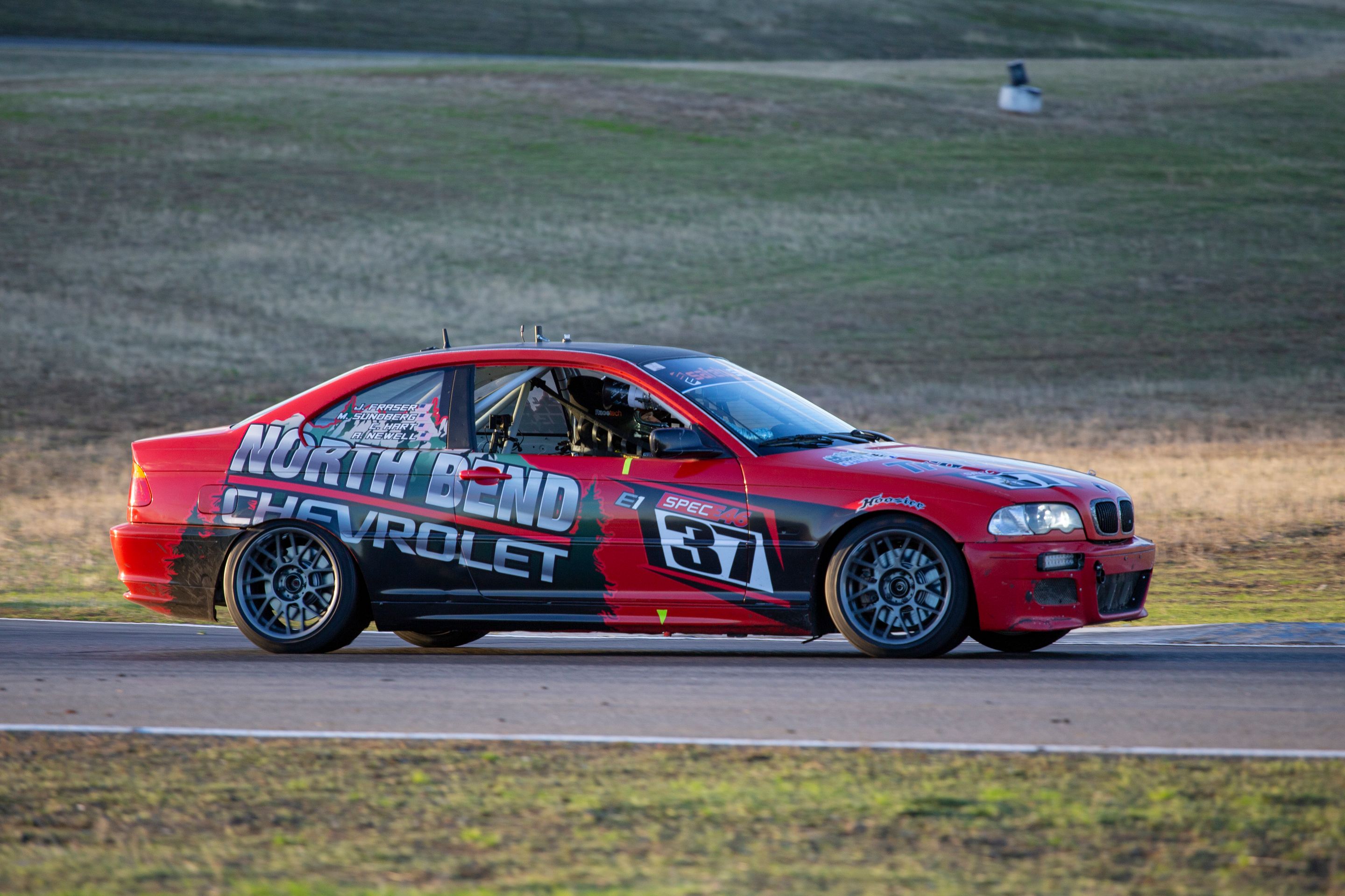 Red BMW Spec E46 with 17" ARC-8 Apex wheels in Race Silver