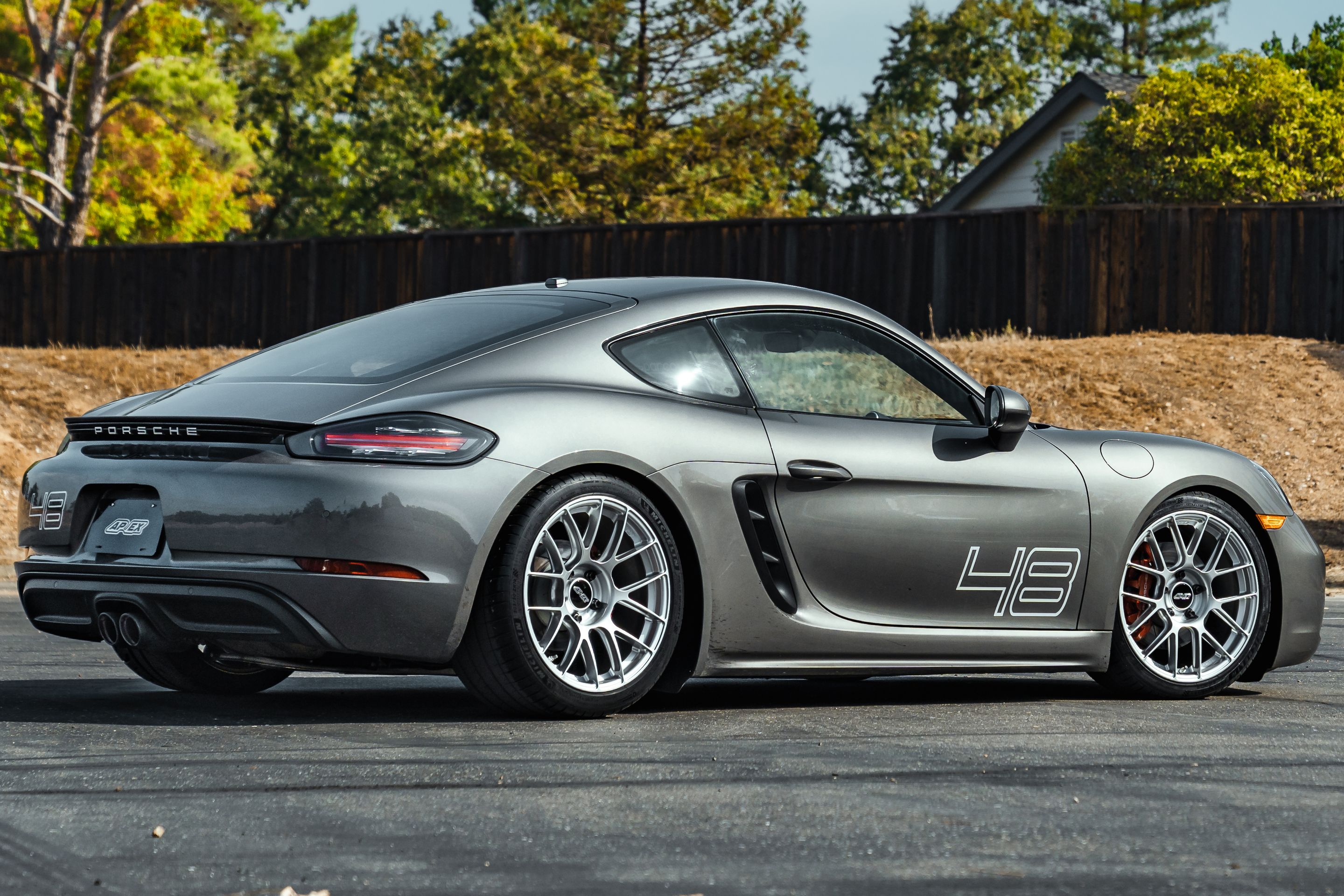 Grey Porsche 718 Cayman S with 19" EC-7RS Apex wheels in Race Silver