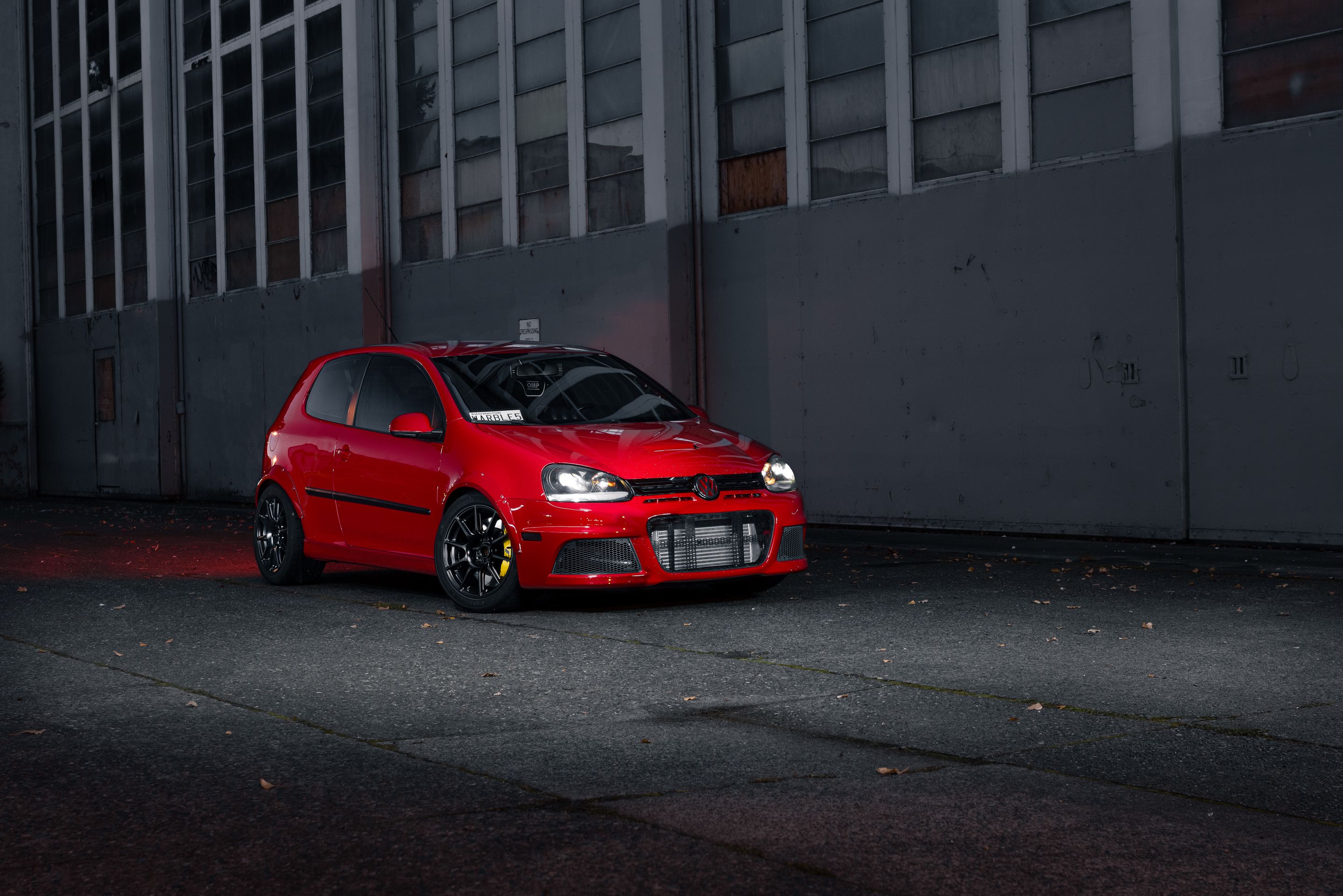 Red VW MK5 Golf with 17" SM-10 Apex wheels in Satin Black