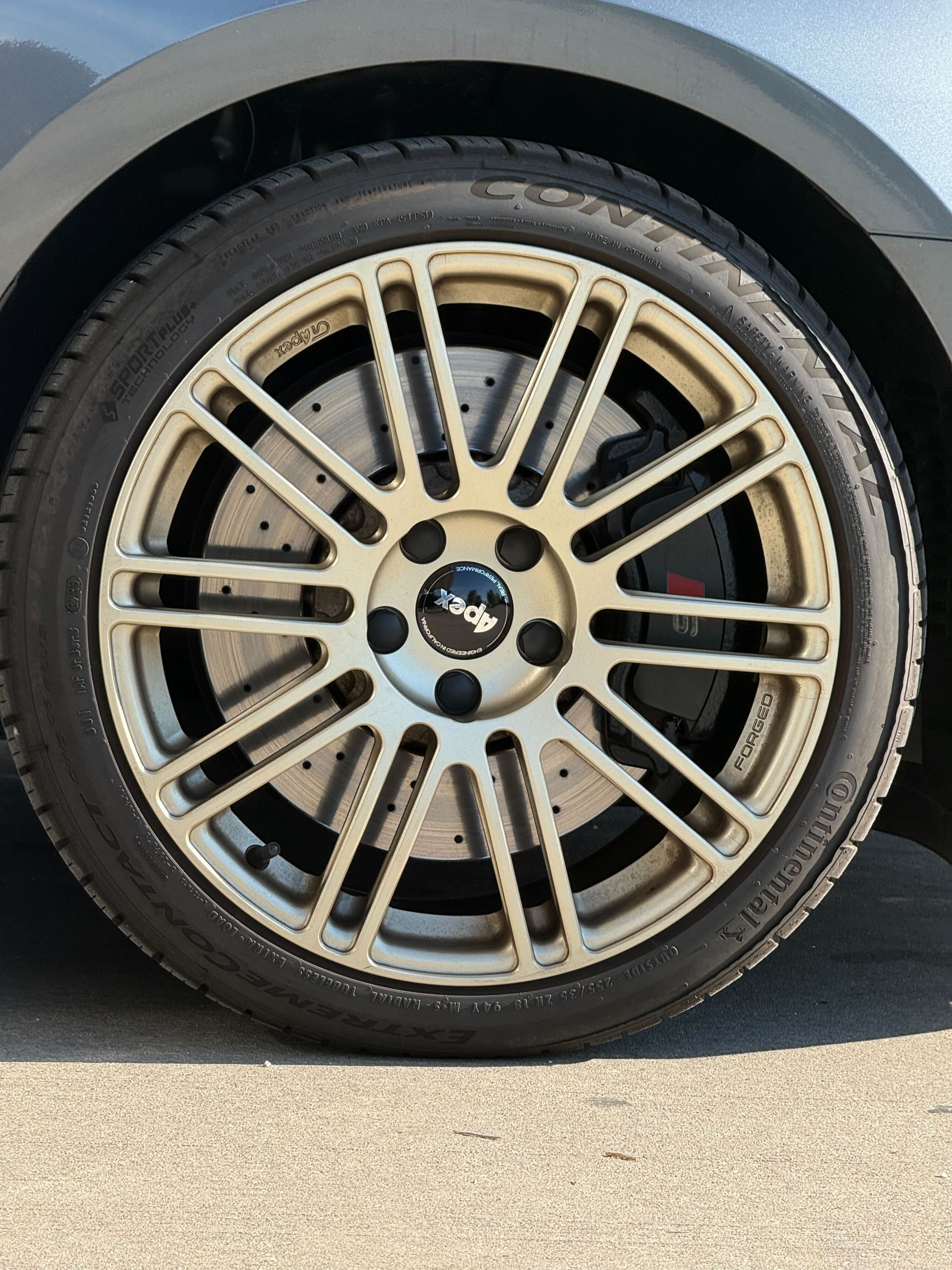 Grey Audi 8Y S3 with 18" TC-10RT Apex wheels in Motorsport Gold